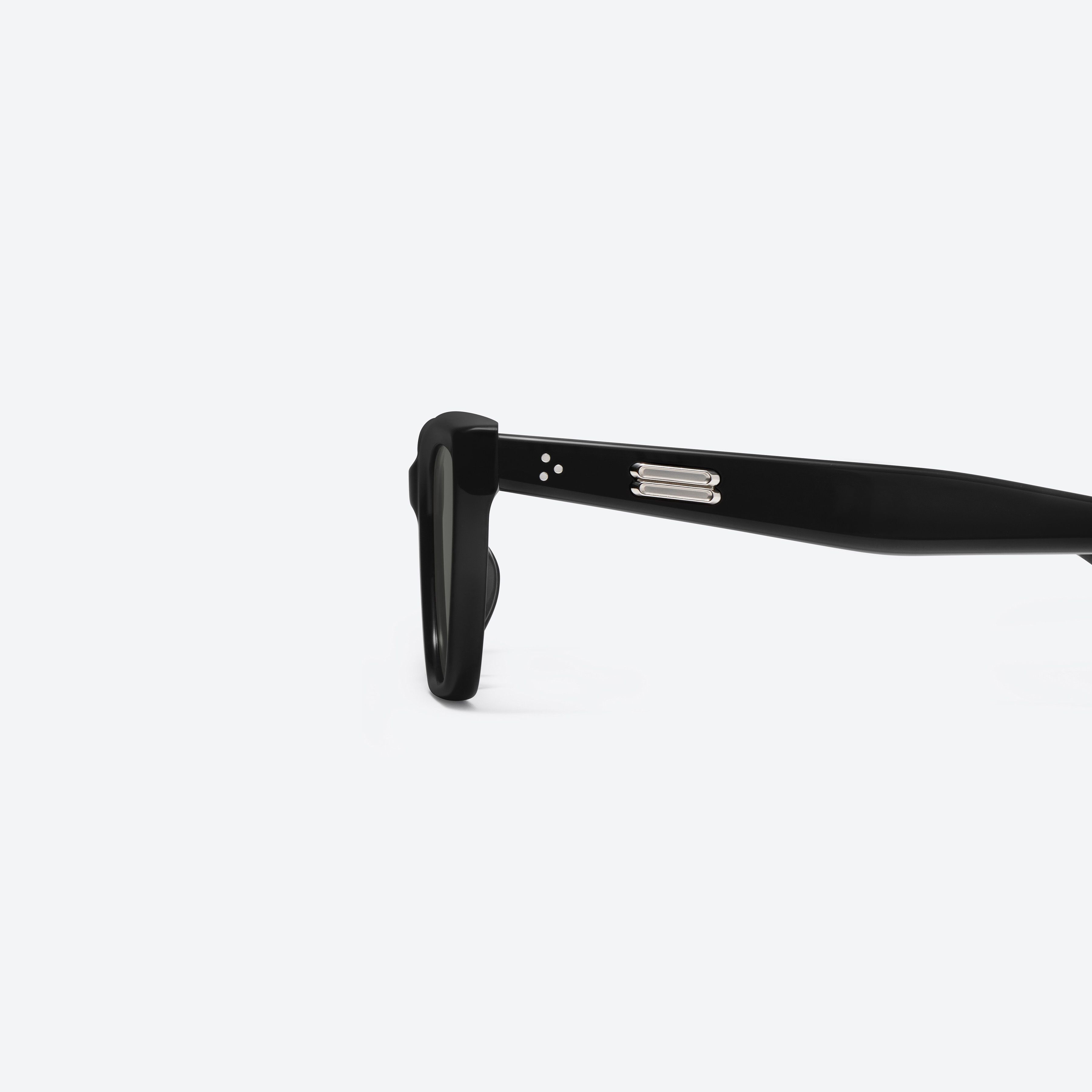 A detailed left view of Gentle Monster Sage 01 Black Acetate framed Cat-eye sunglasses.