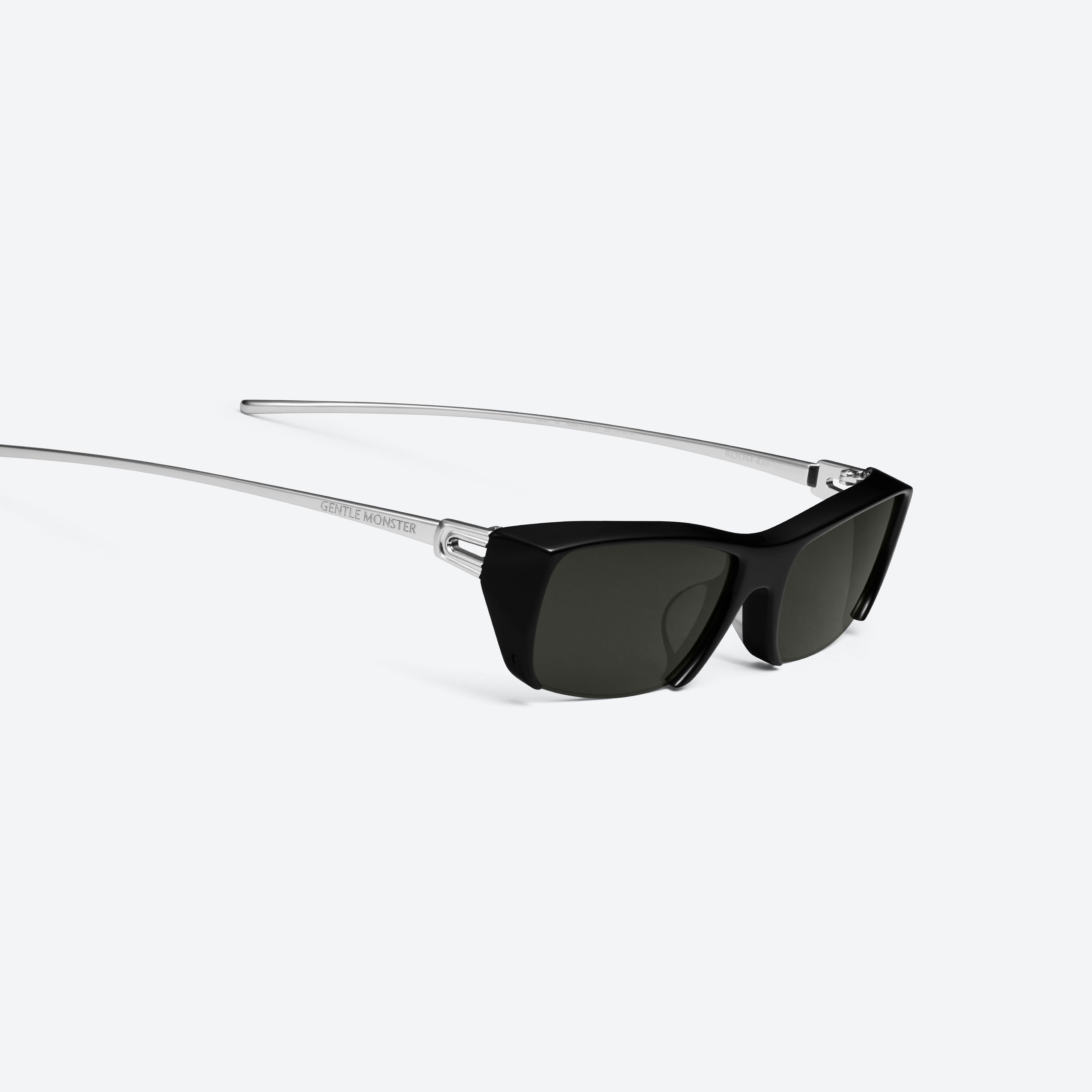 45-degree detailed view of Gentle Monster Room 433 01 Black Mixed framed Square sunglasses.