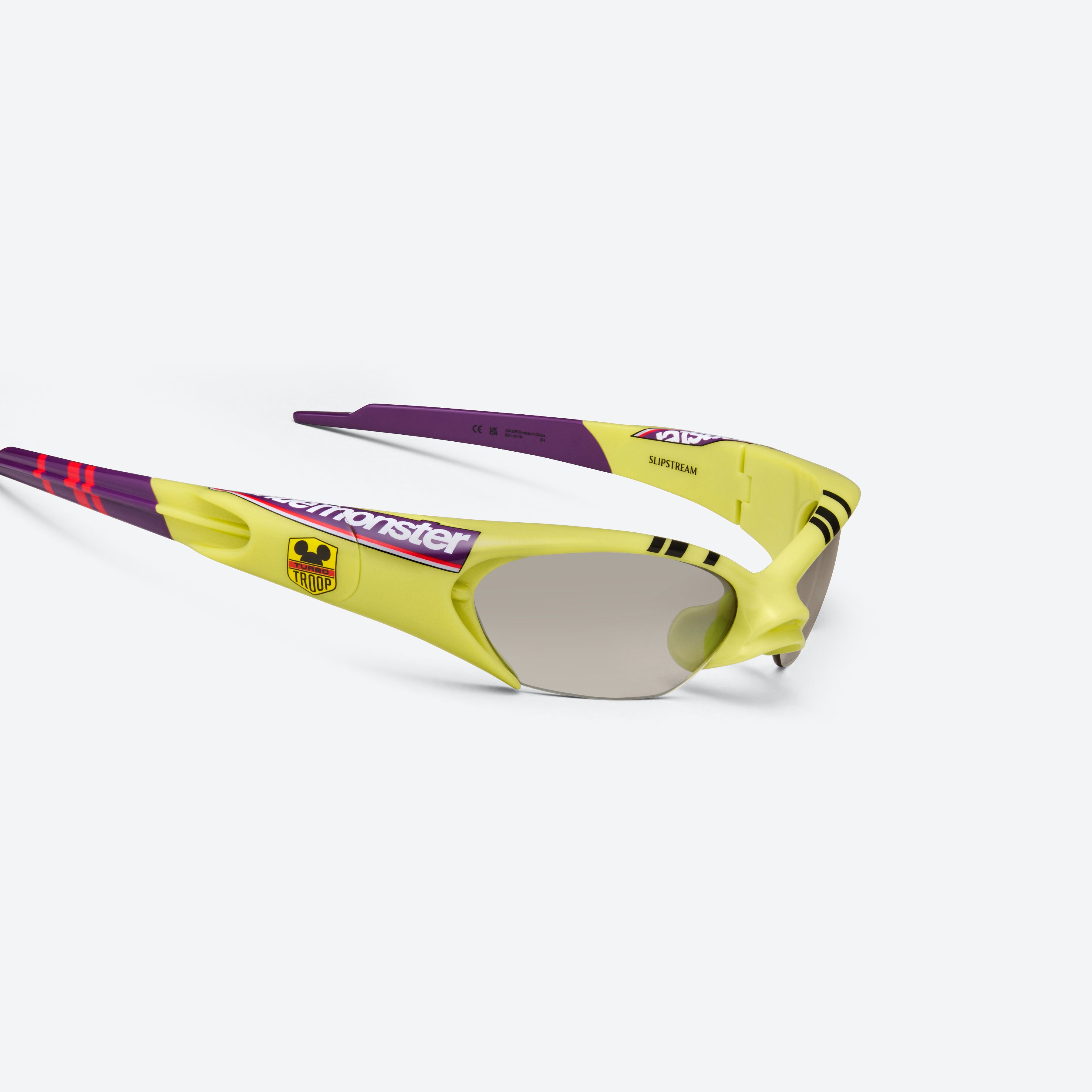 45-degree detailed view of Gentle Monster Disney F1 - Slipstream GR13 Green Nylon framed Wraparound sunglasses.