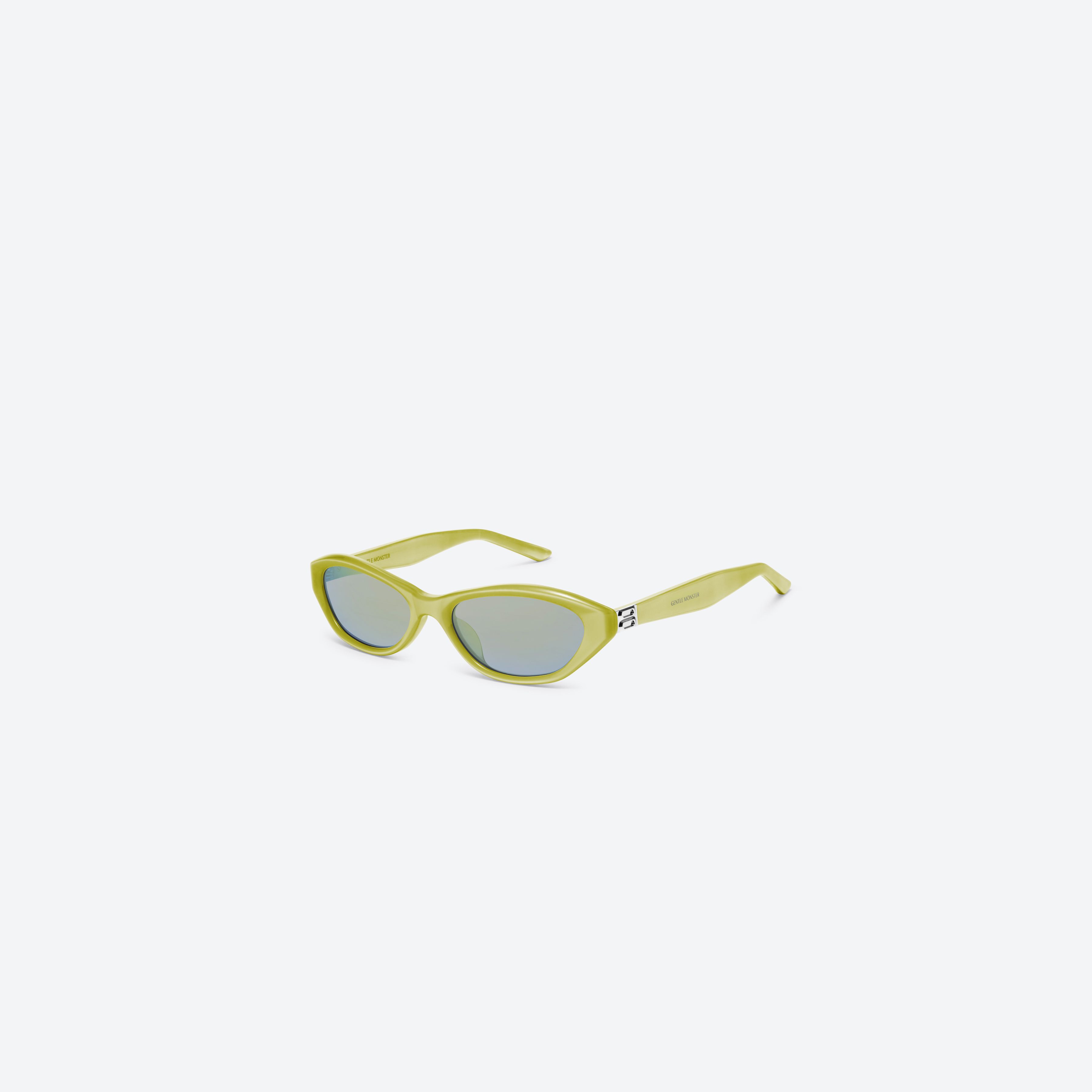45-degree view of Gentle Monster Lamda Y9 Yellow Acetate framed Cat-eye sunglasses.