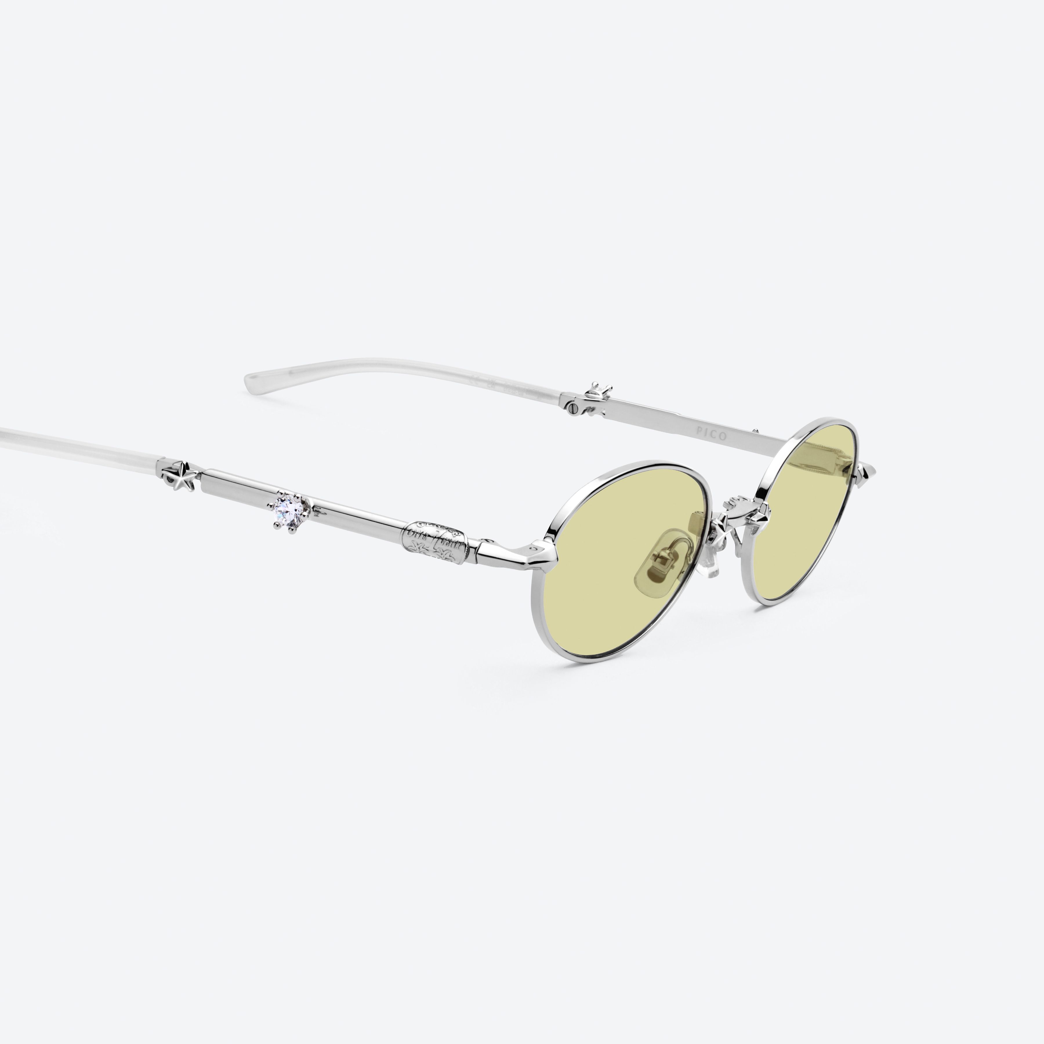 45-degree detailed view of Gentle Monster Pico 02(GRM) Silver Metal framed Oval glasses.