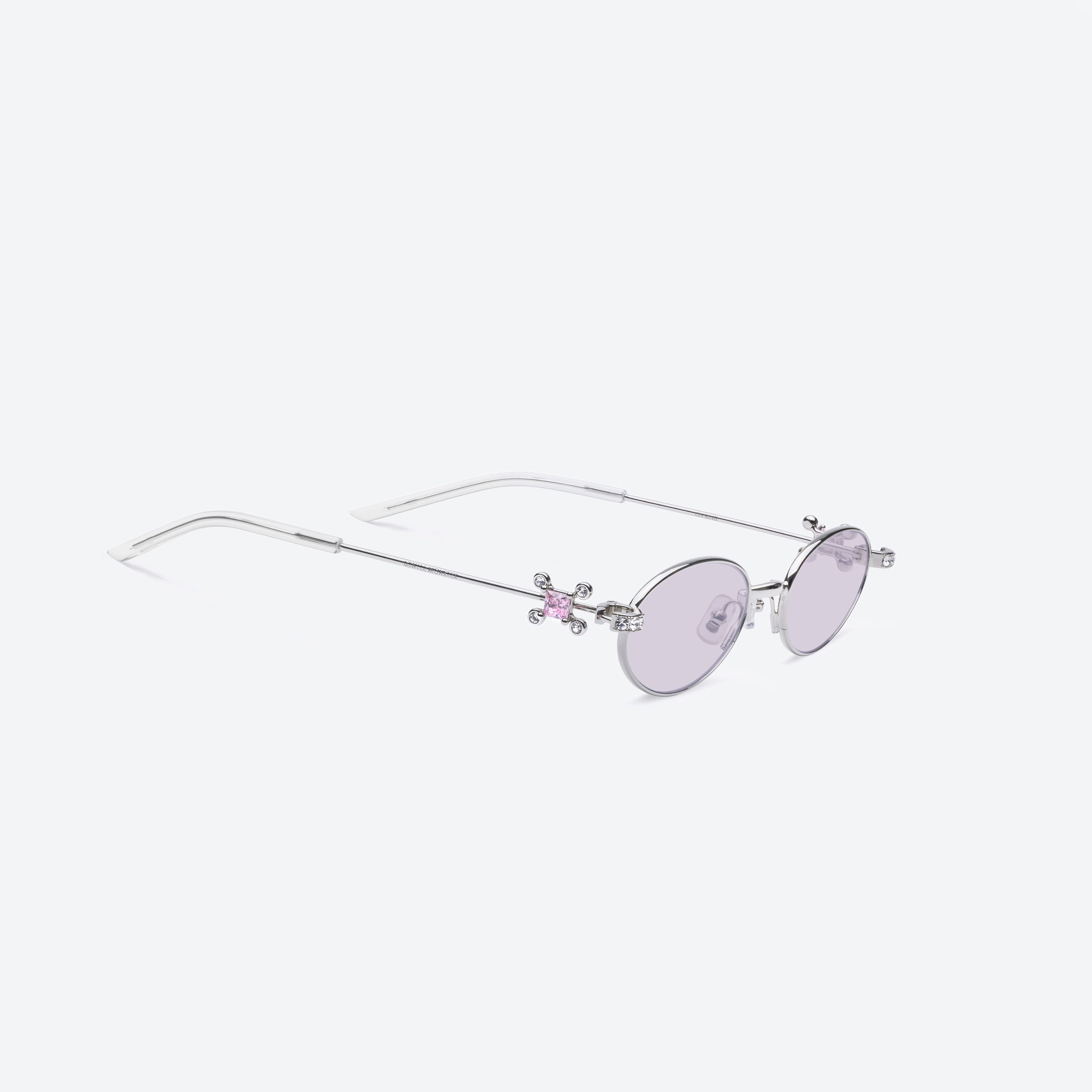 45-degree detailed view of Gentle Monster On Ring 02(V) Silver Metal framed Oval sunglasses.