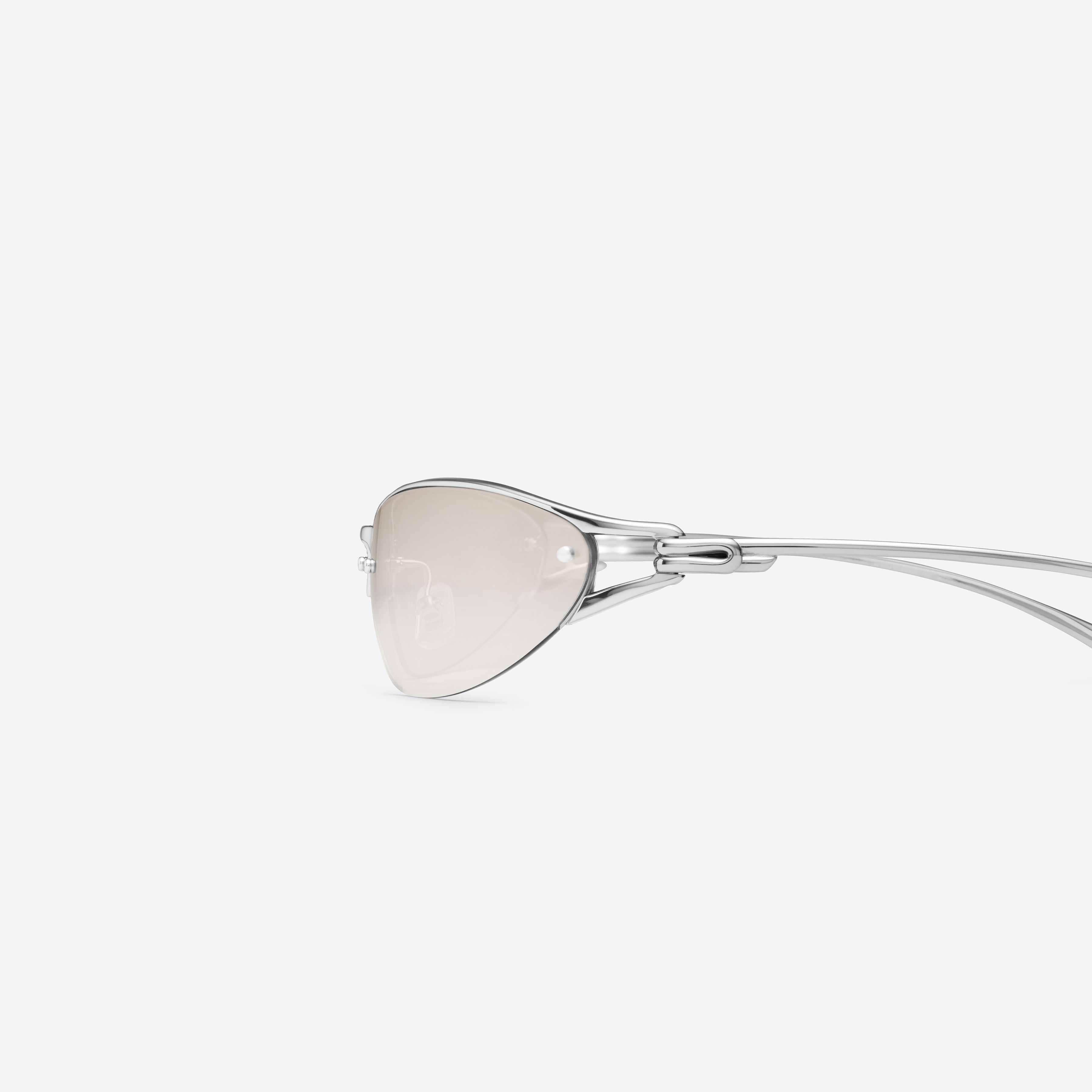 A detailed left view of Gentle Monster Futura 02 Silver Metal framed Wraparound sunglasses.