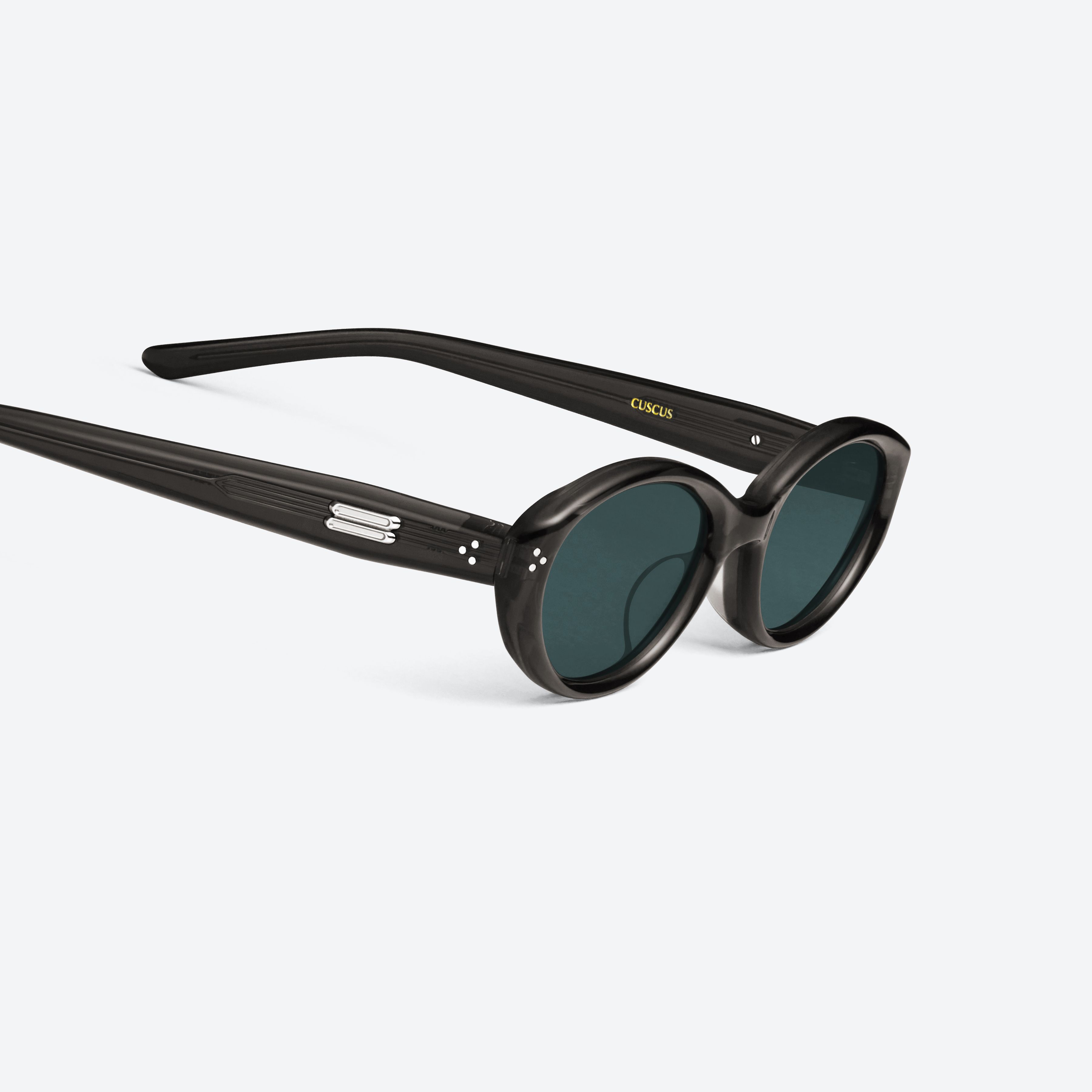 45-degree detailed view of Gentle Monster Cuscus BRC21 Brown Acetate framed Oval sunglasses.