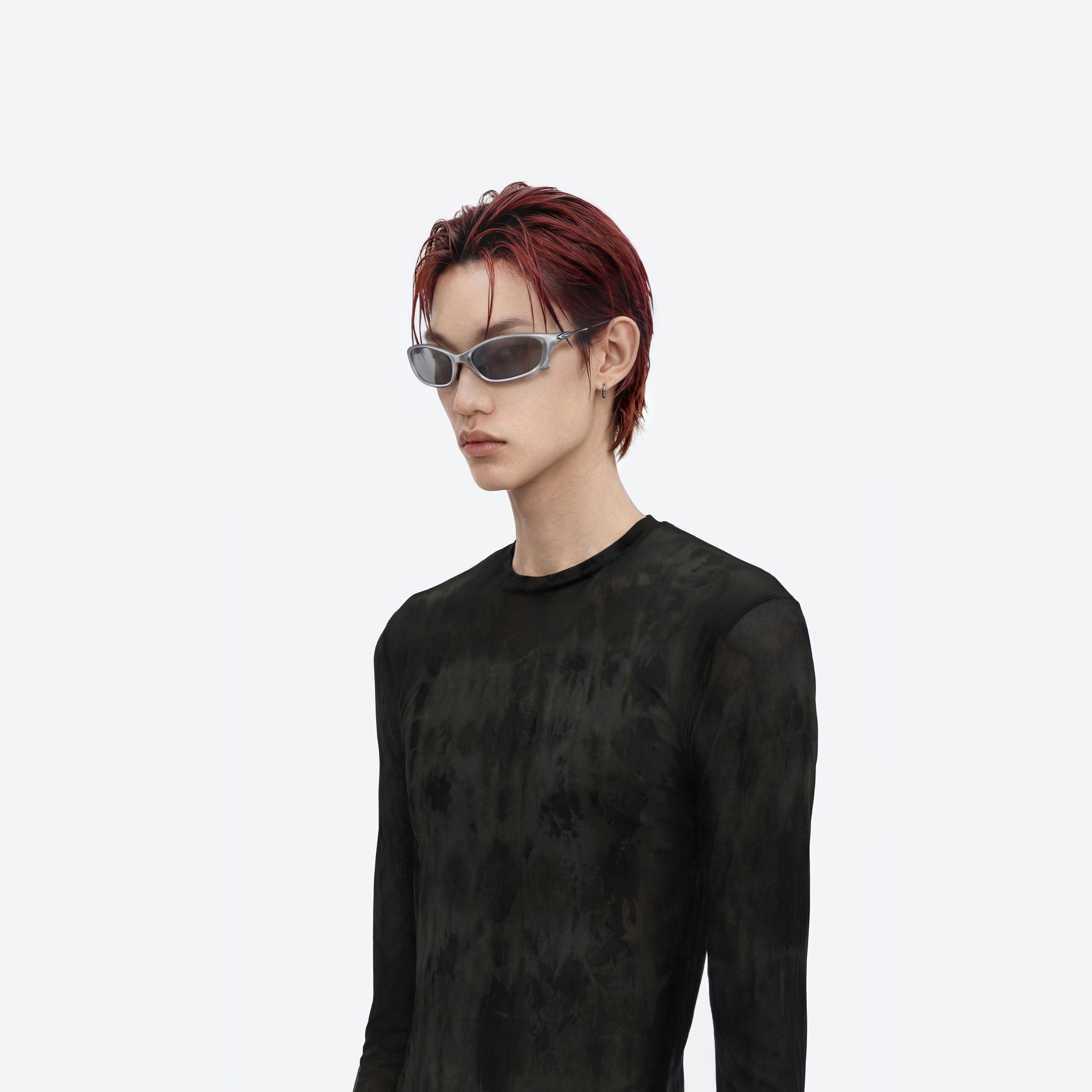 Model wearing the Turbo MG21 Gray Mixed framed Wraparound sunglasses.