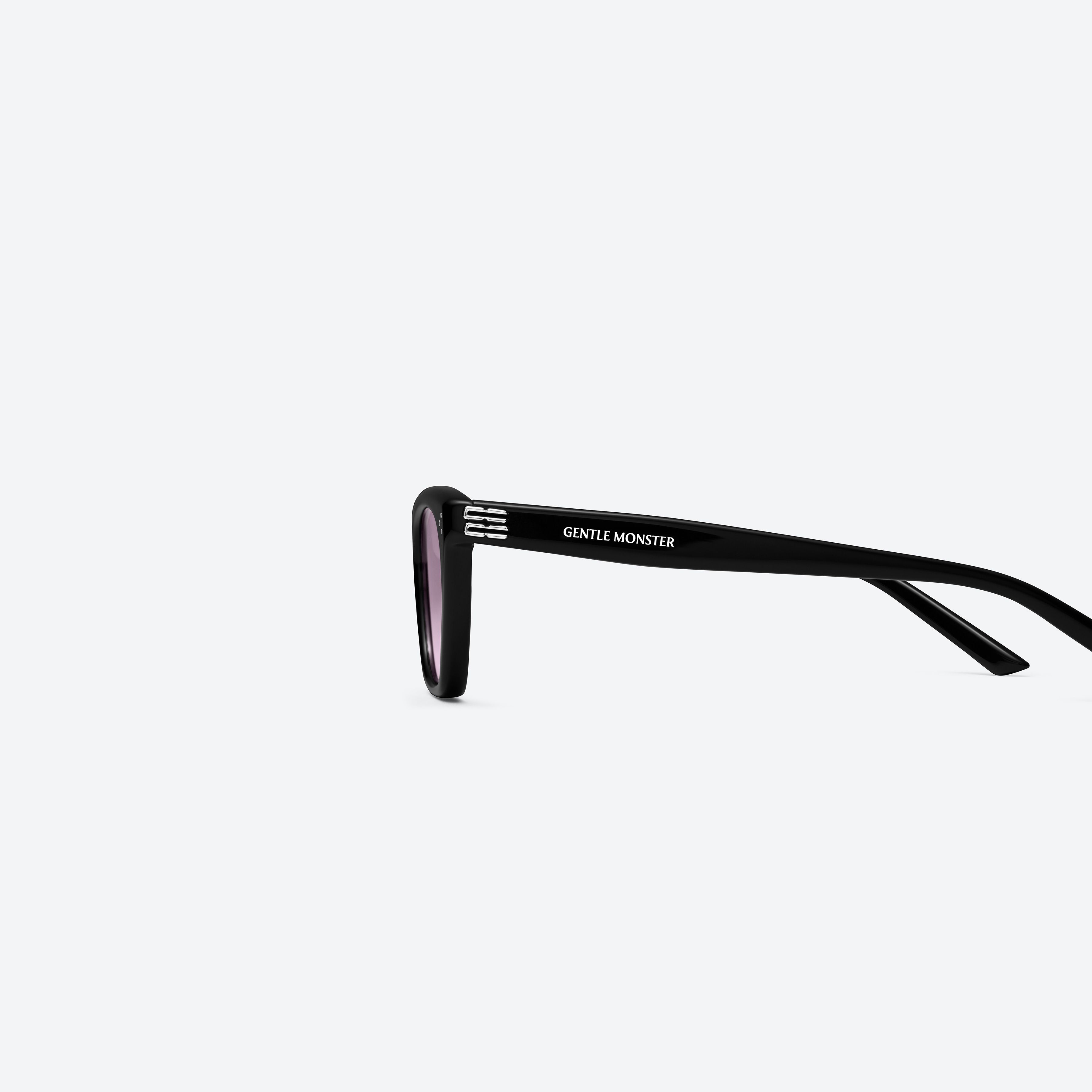 A detailed left view of Gentle Monster Gisele 01(V) Black Acetate framed Cat-eye sunglasses.