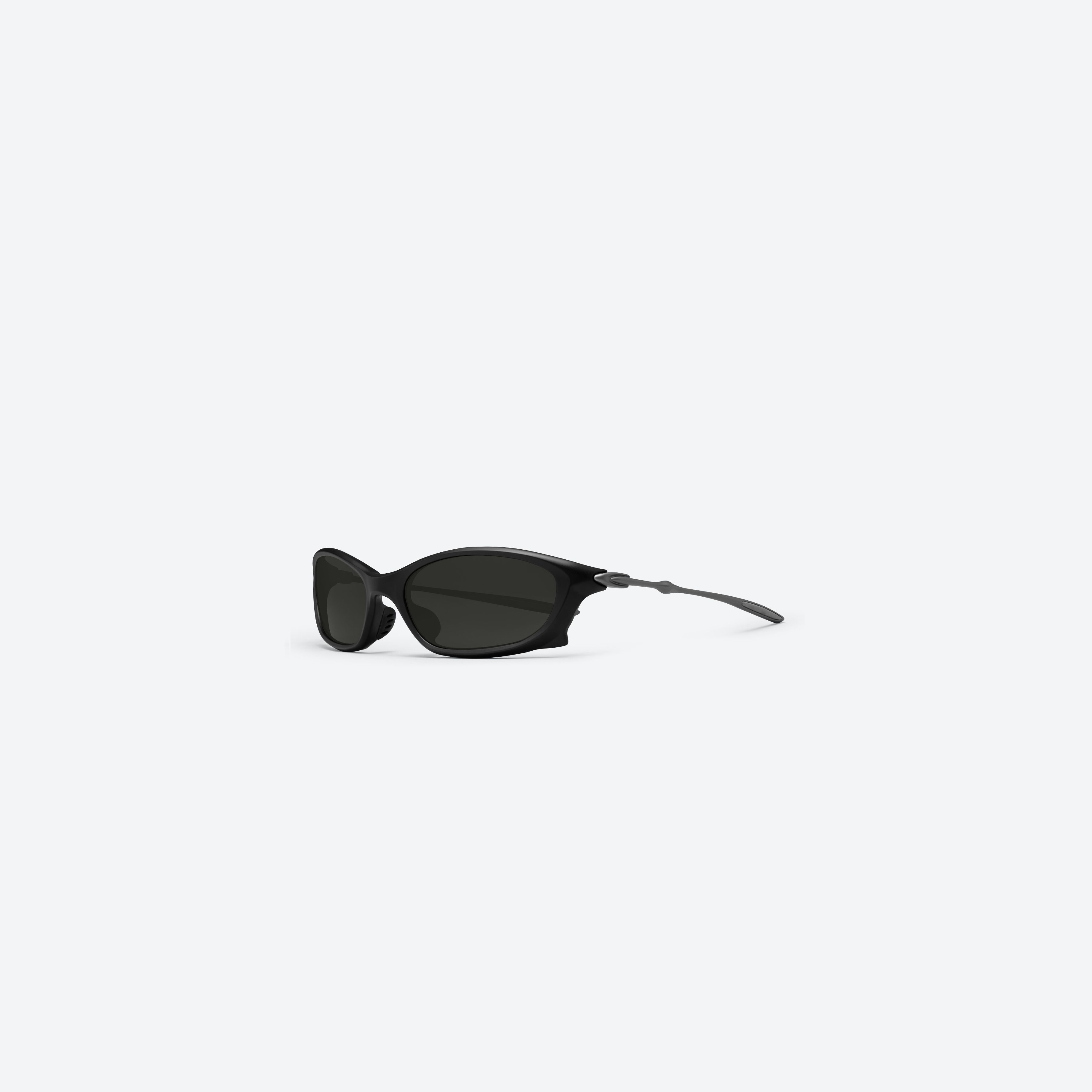 45-degree view of Gentle Monster Turbo M01 Black Mixed framed Wraparound sunglasses.