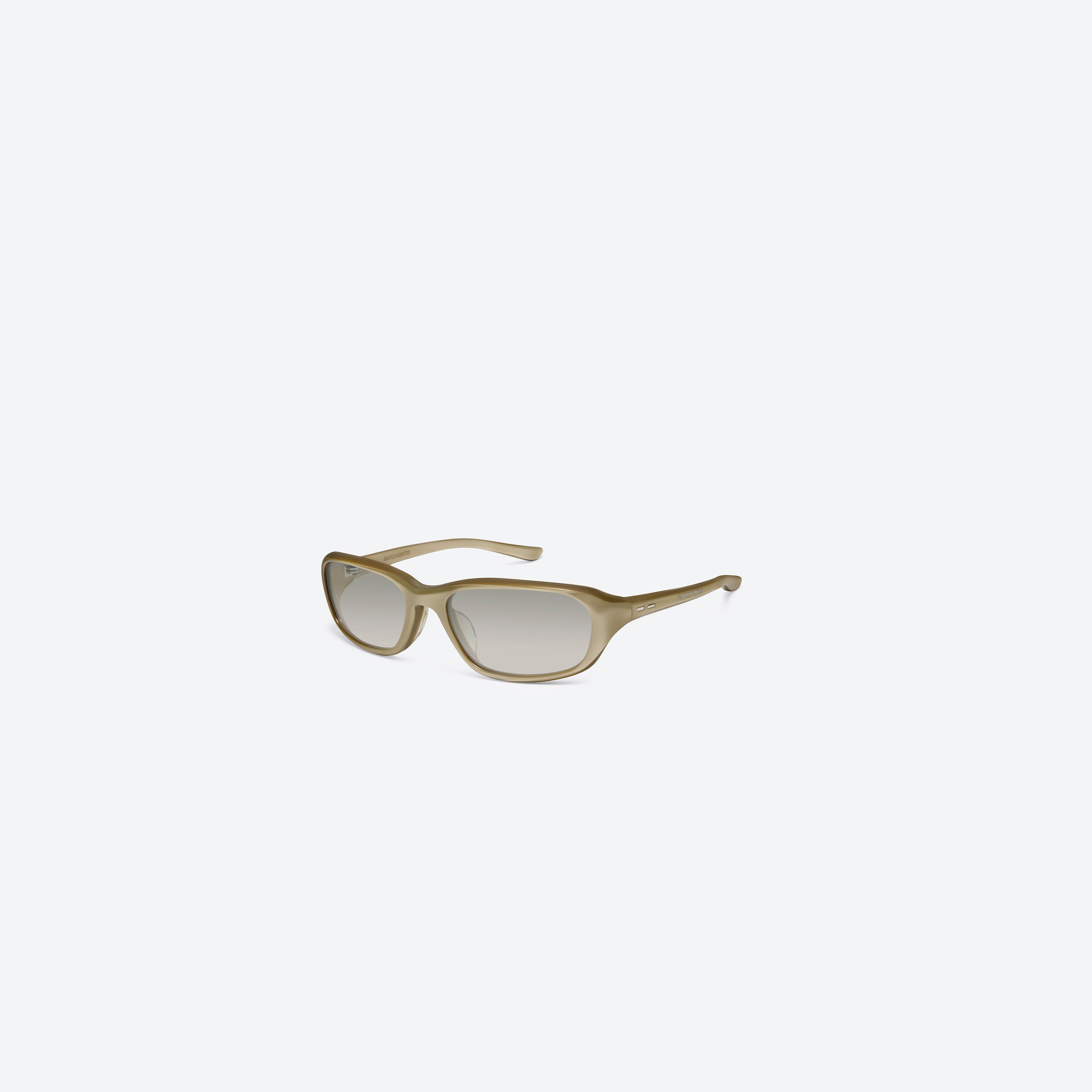 45-degree view of Gentle Monster Hills GDC2 Gold Acetate framed Wraparound sunglasses.