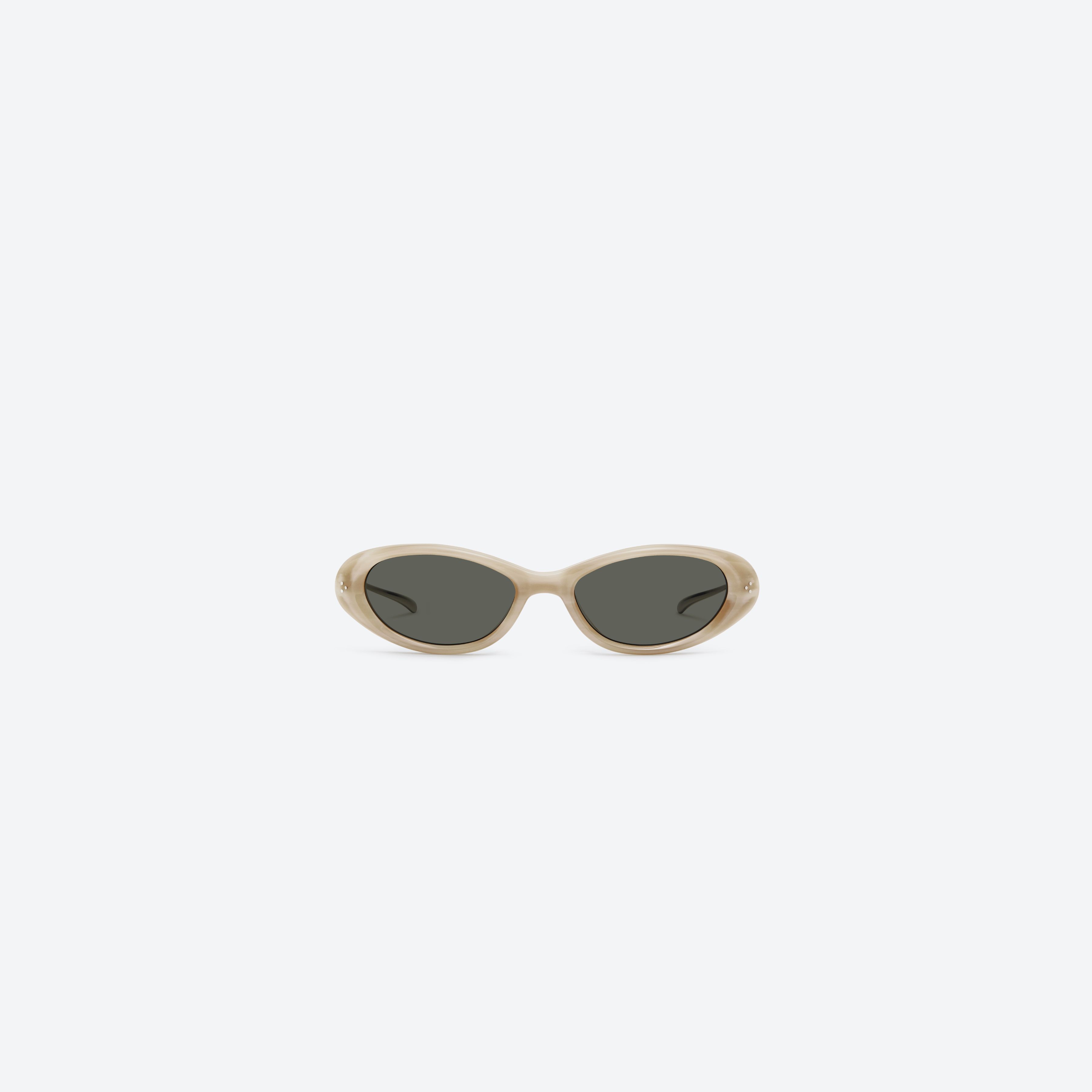 A front view of Gentle Monster Ora IVD1 Ivory Mixed framed Oval sunglasses.