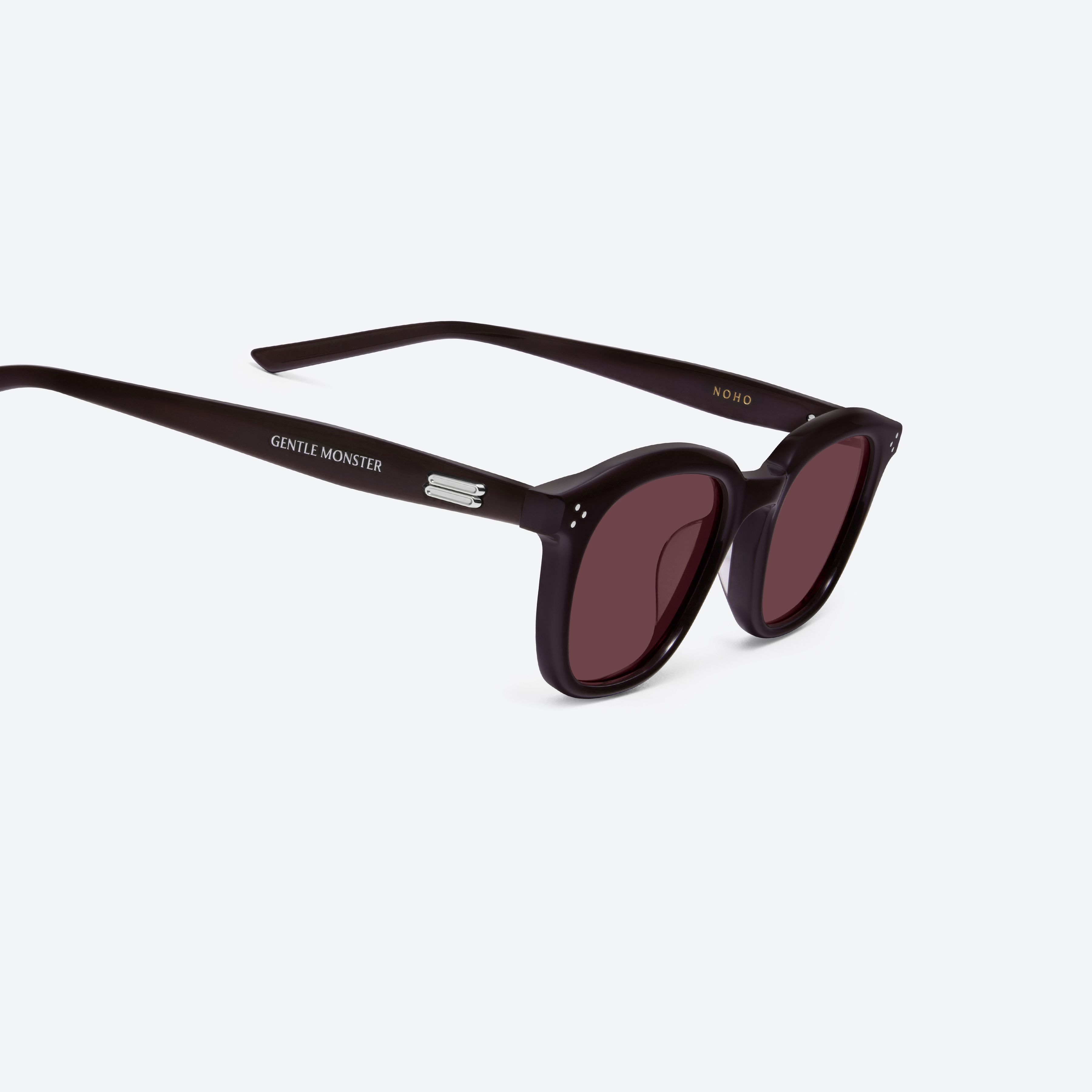 45-degree detailed view of Gentle Monster Noho R12 Red Acetate framed Round sunglasses.