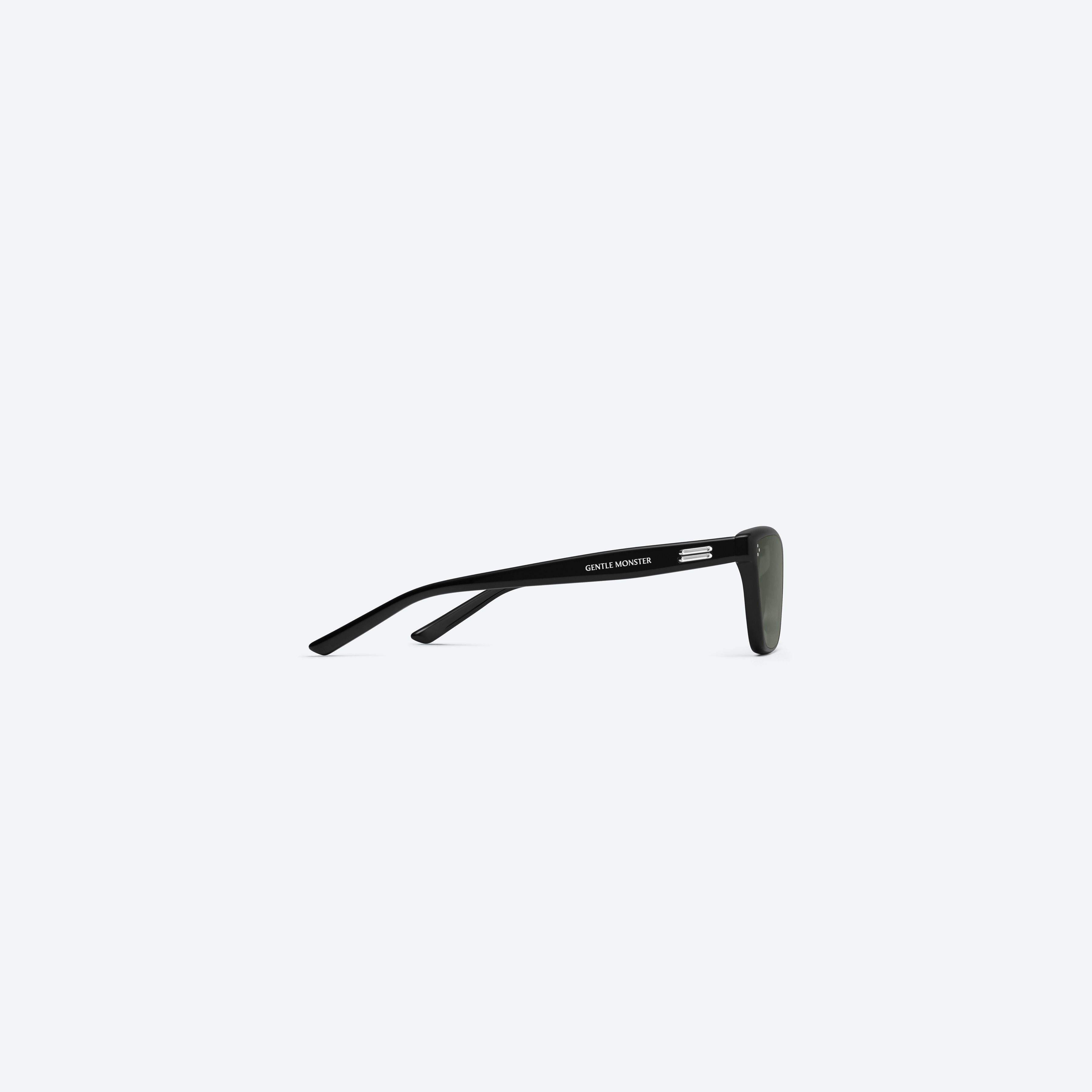 A detailed right view of Gentle Monster Dodo 01 Black Acetate framed Cat-eye sunglasses.