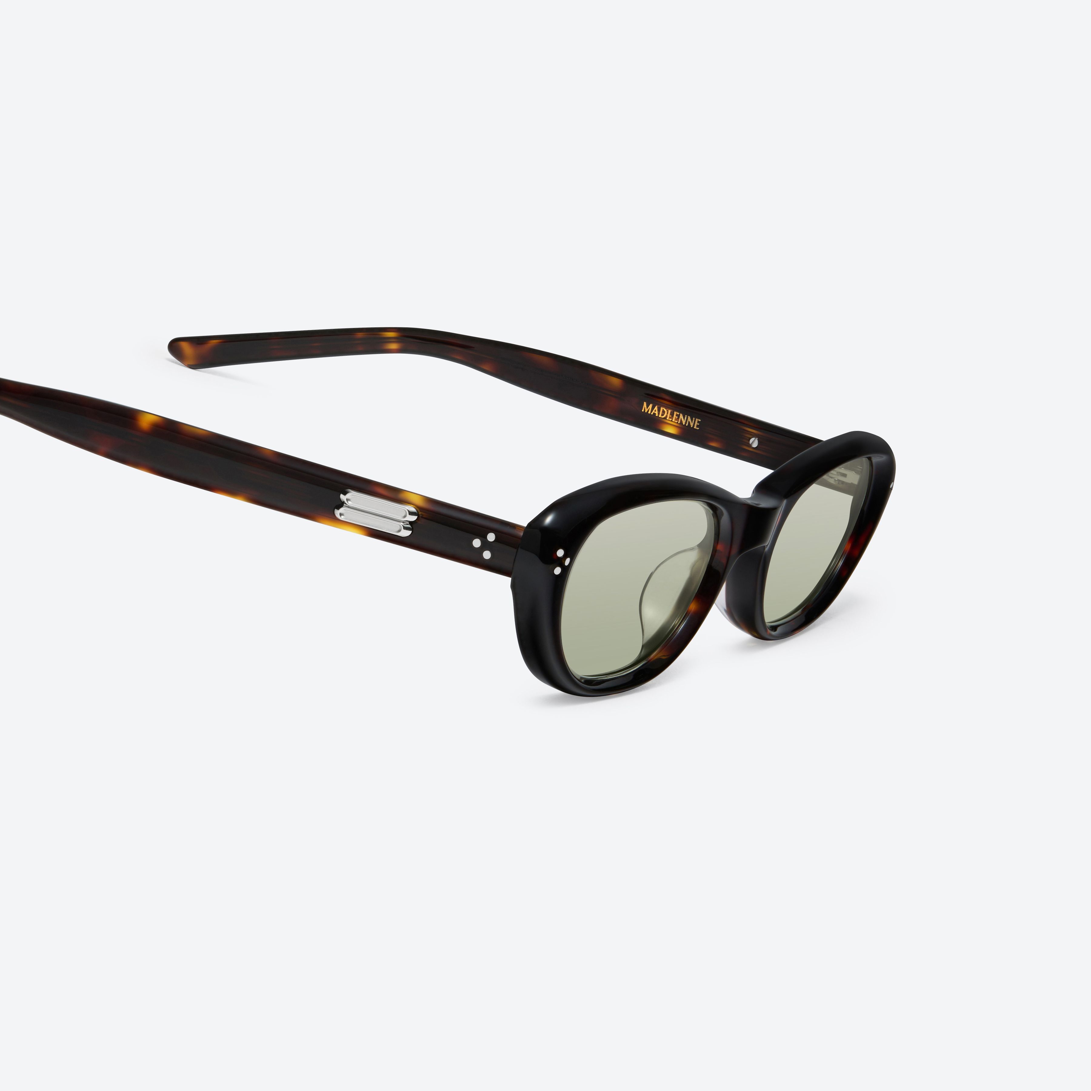 45-degree detailed view of Gentle Monster Madlenne T9 Tortoise Acetate framed Cat-eye sunglasses.