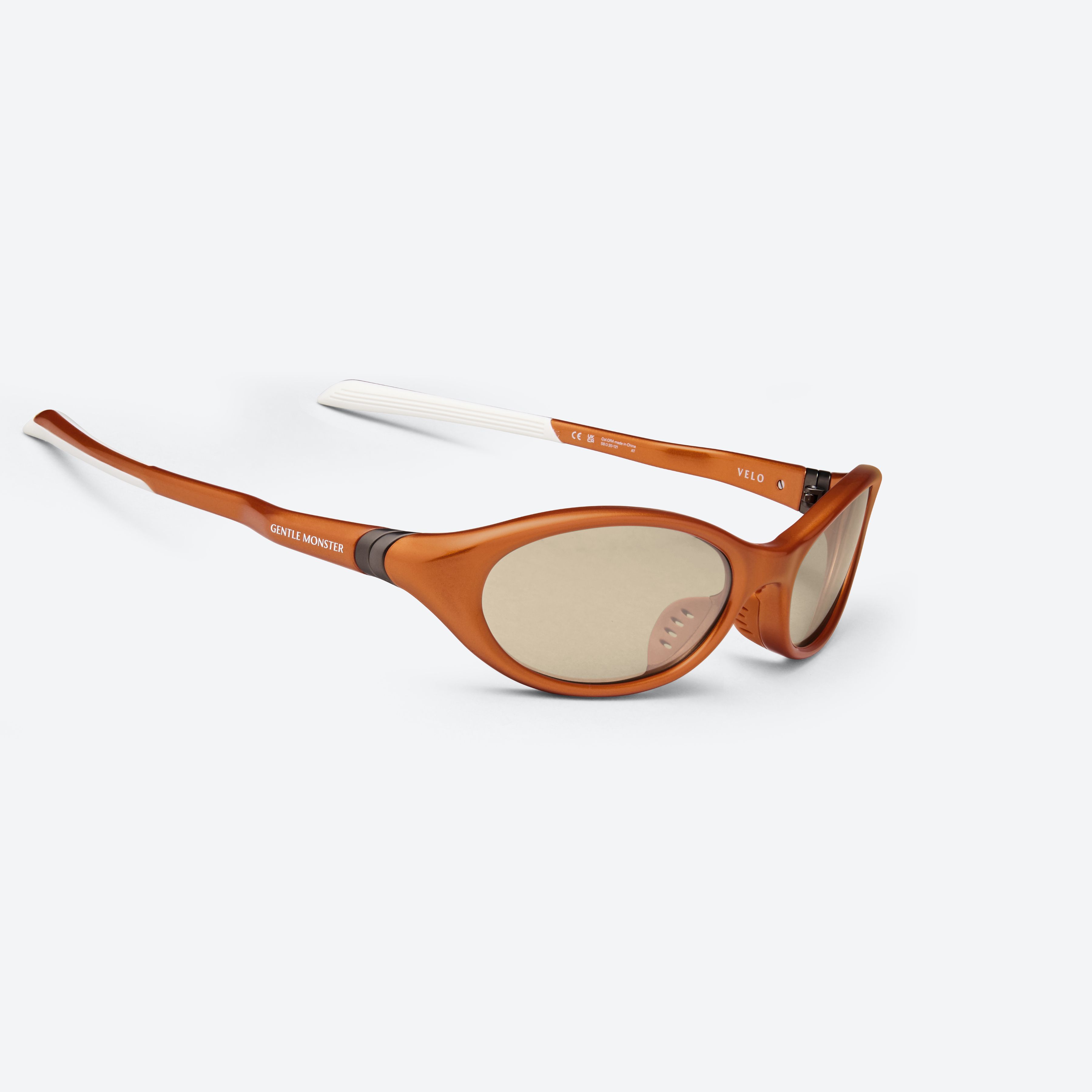 45-degree detailed view of Gentle Monster Velo OR4 Orange Nylon framed Wraparound sunglasses.