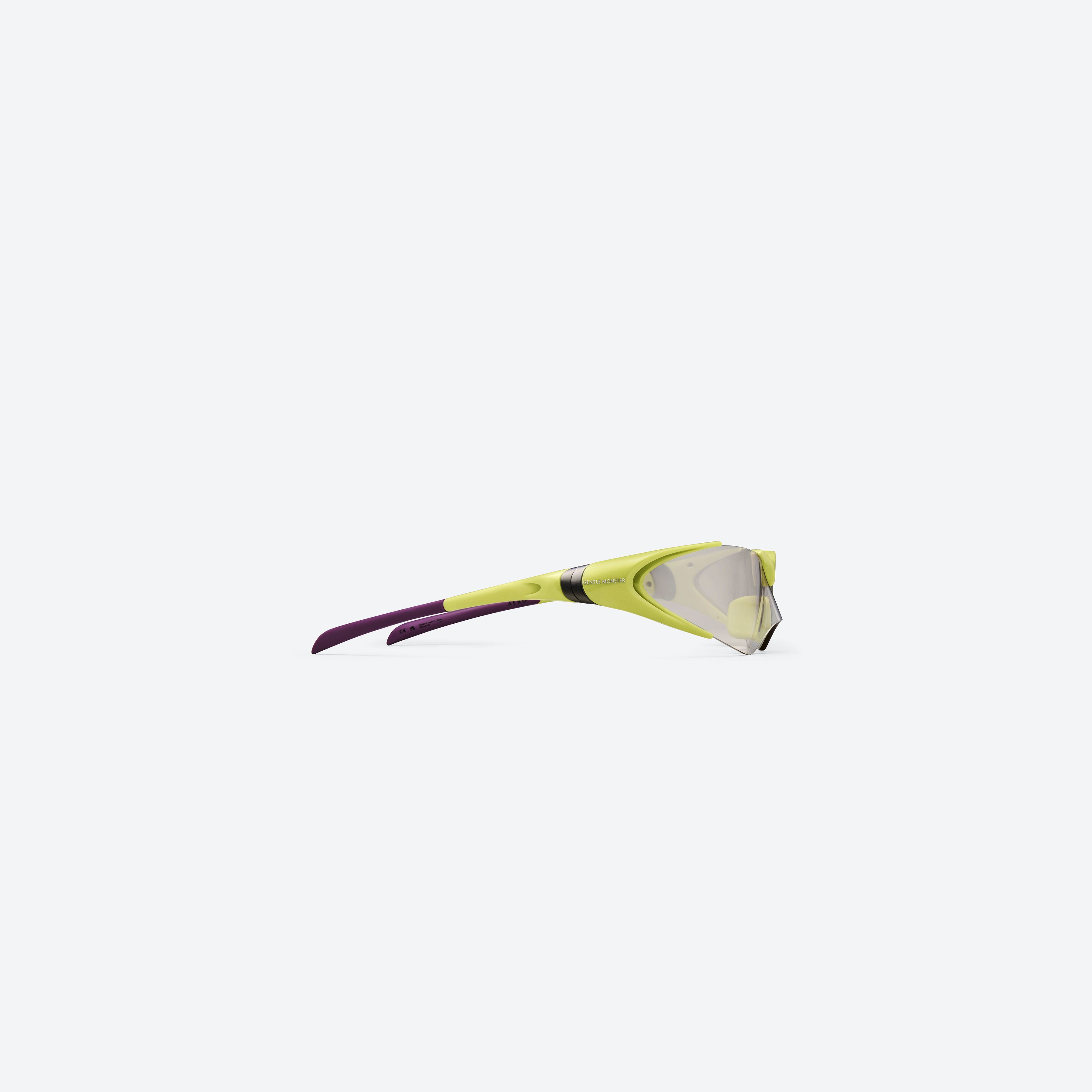 A detailed right view of Gentle Monster Disney F1 - Aero GR13 Green Nylon framed Wraparound sunglasses.
