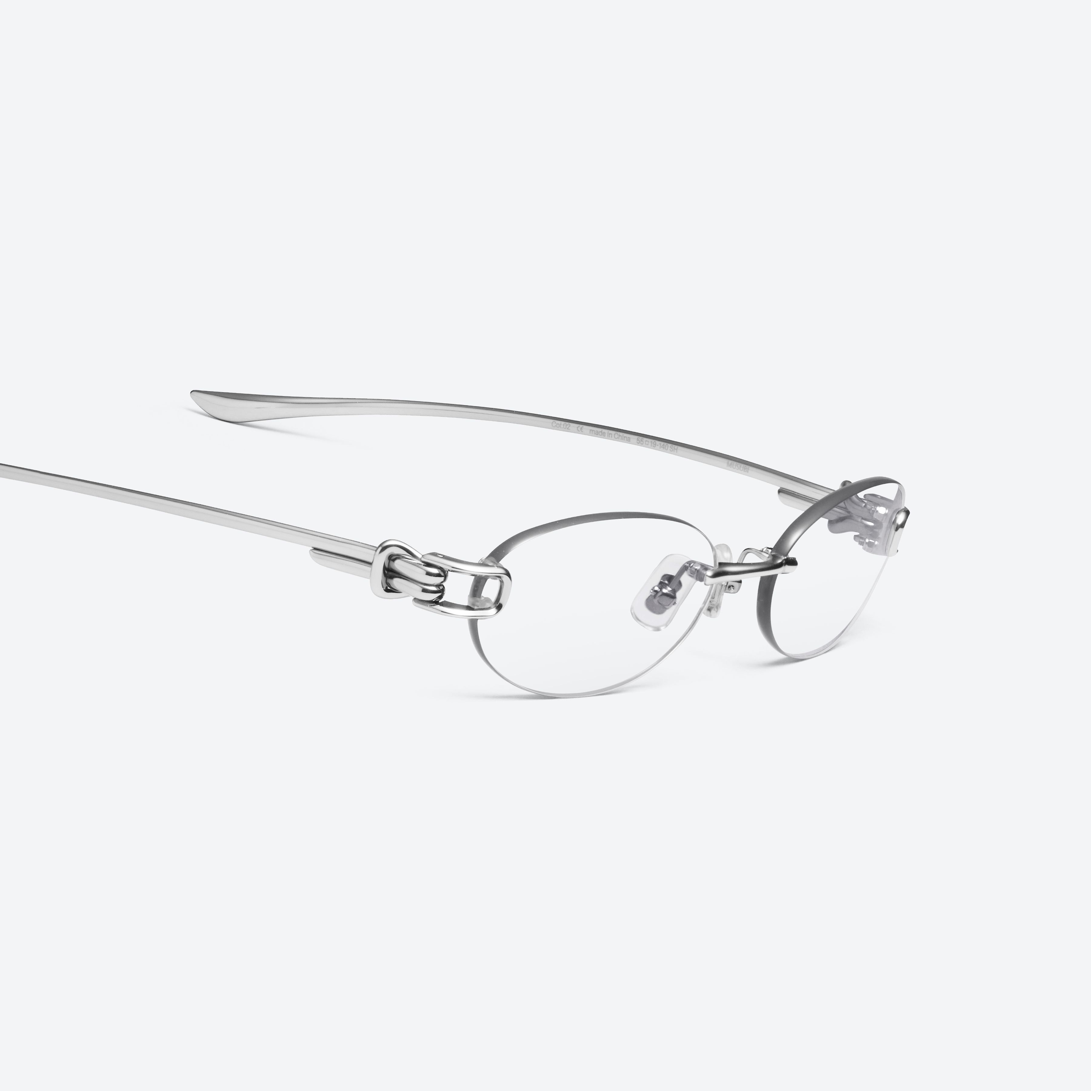 45-degree detailed view of Gentle Monster Musubi 02 Silver Metal framed Oval glasses.