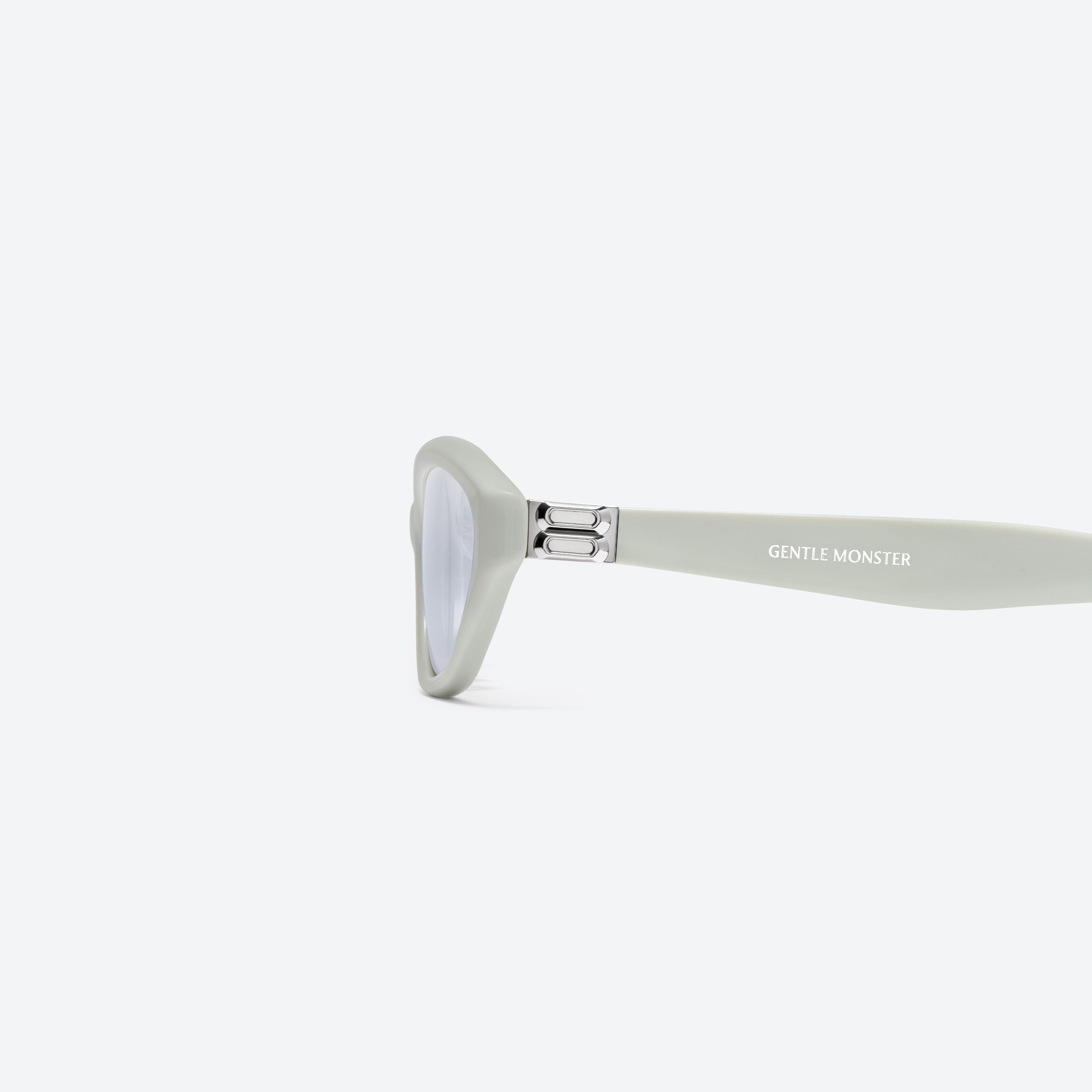 A detailed left view of Gentle Monster Lamda GR11 Green Acetate framed Cat-eye sunglasses.