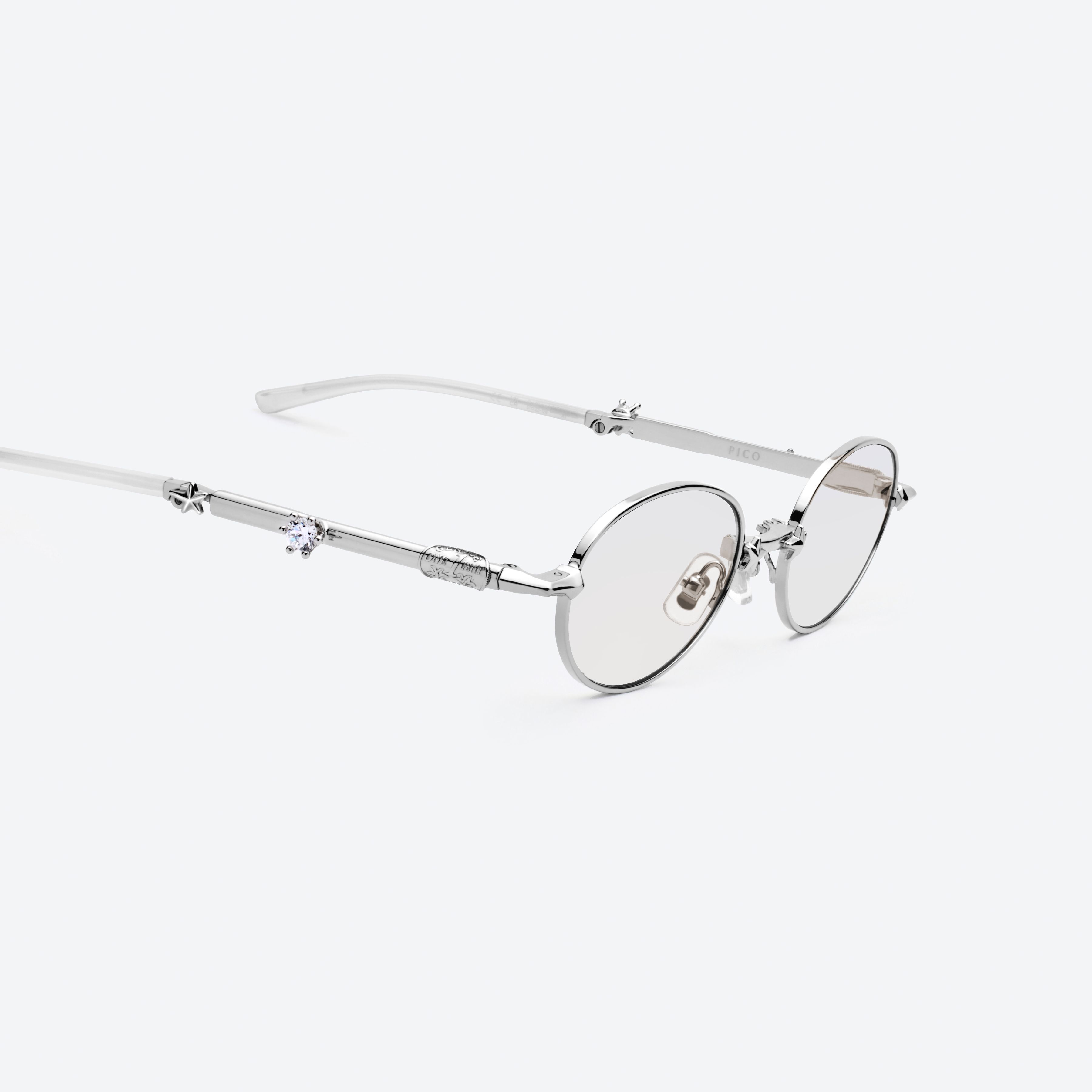 45-degree detailed view of Gentle Monster Pico 02(SM) Silver Metal framed Oval glasses.