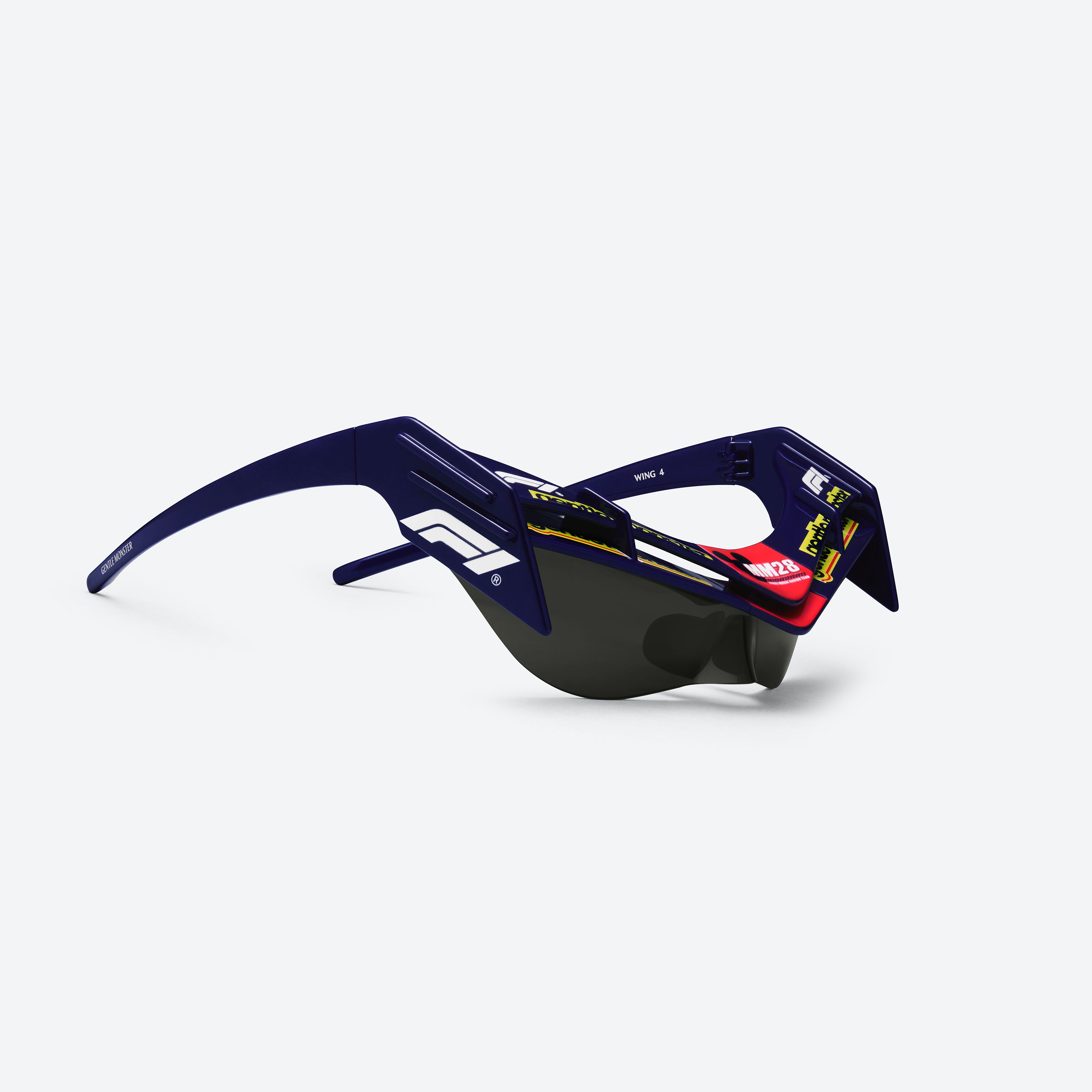 45-degree detailed view of Gentle Monster Disney F1 - Wing 4 N8 Blue Nylon framed Wraparound sunglasses.