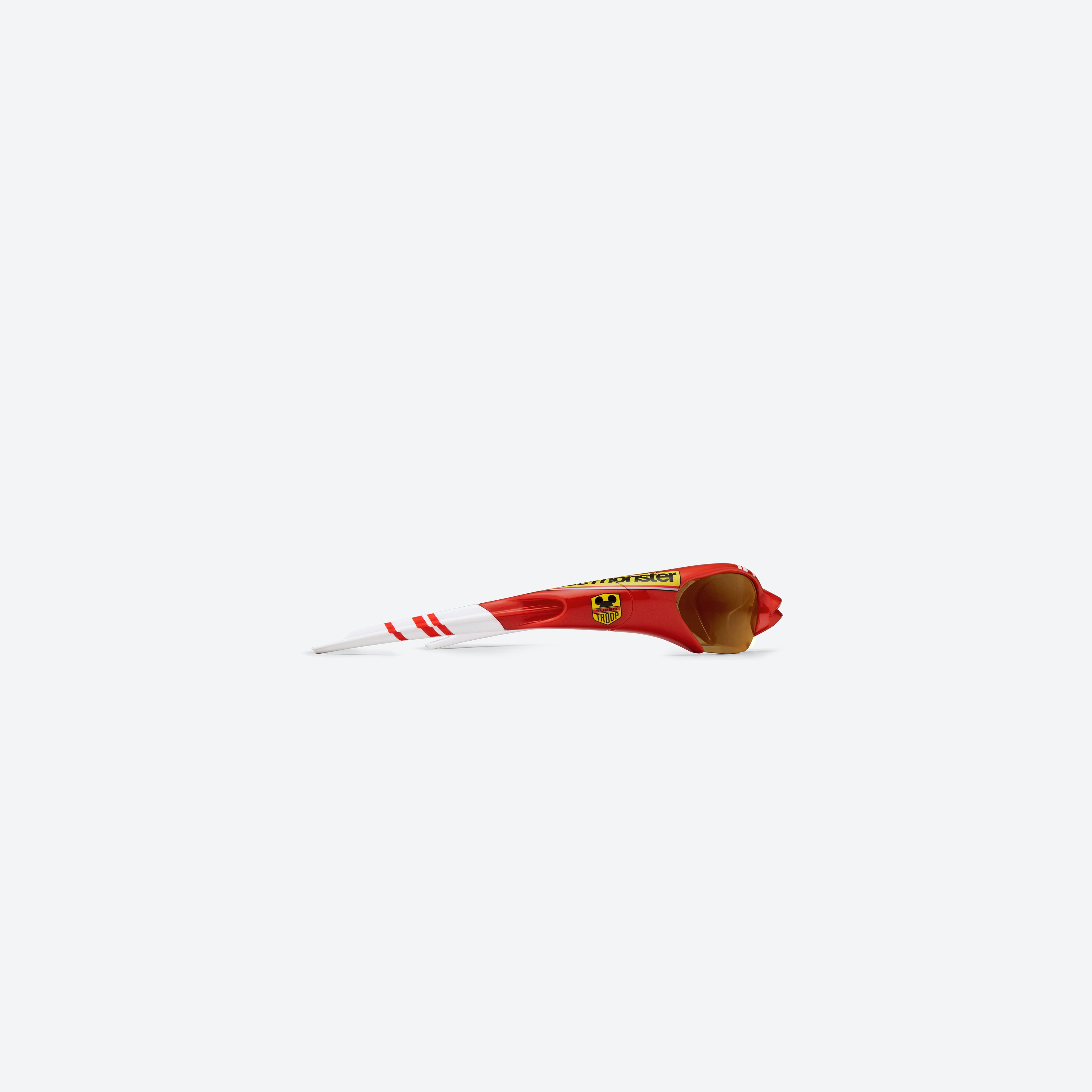A detailed right view of Gentle Monster Disney F1 - Slipstream R13 Red Nylon framed Wraparound sunglasses.