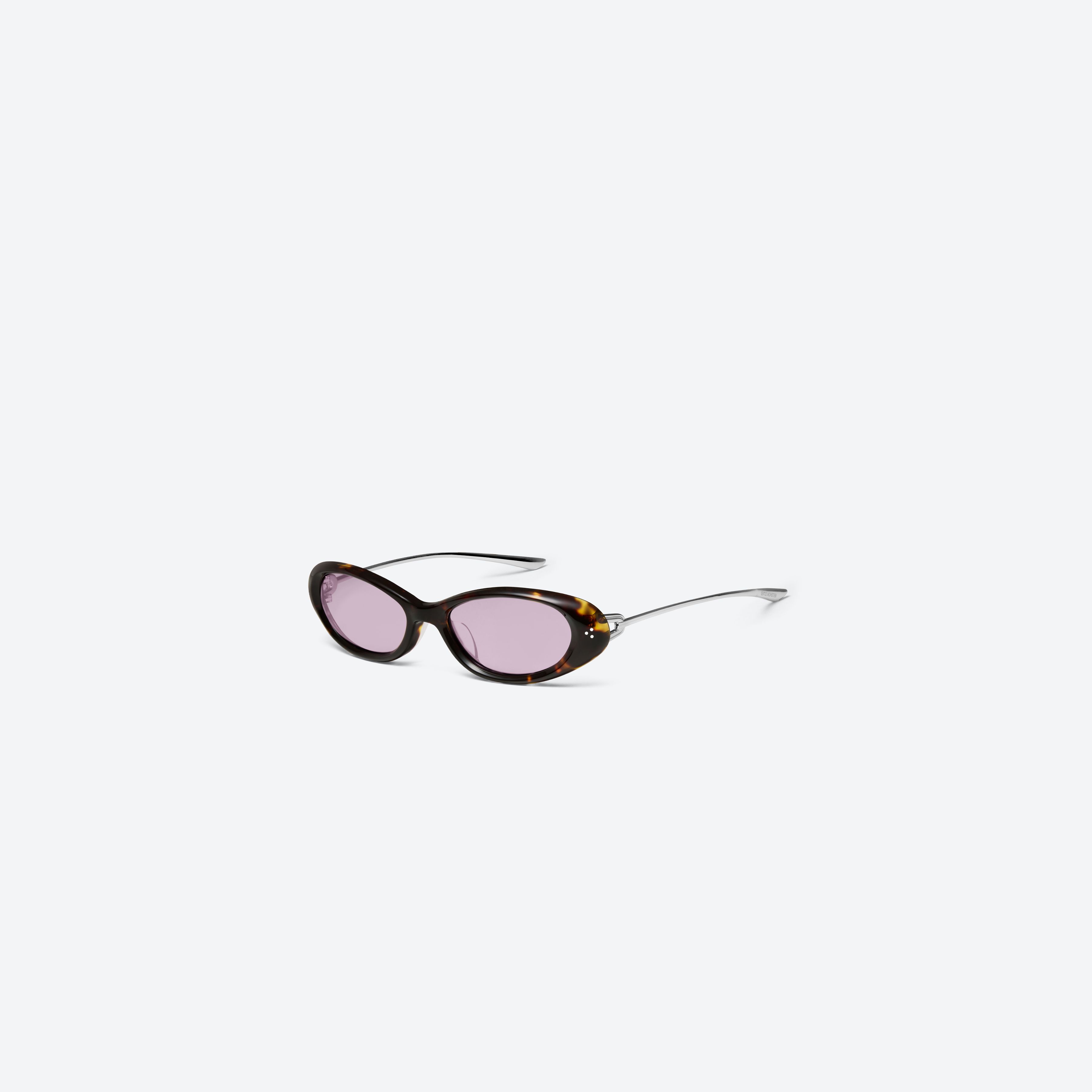 45-degree view of Gentle Monster Ora T9 Tortoise Mixed framed Oval sunglasses.