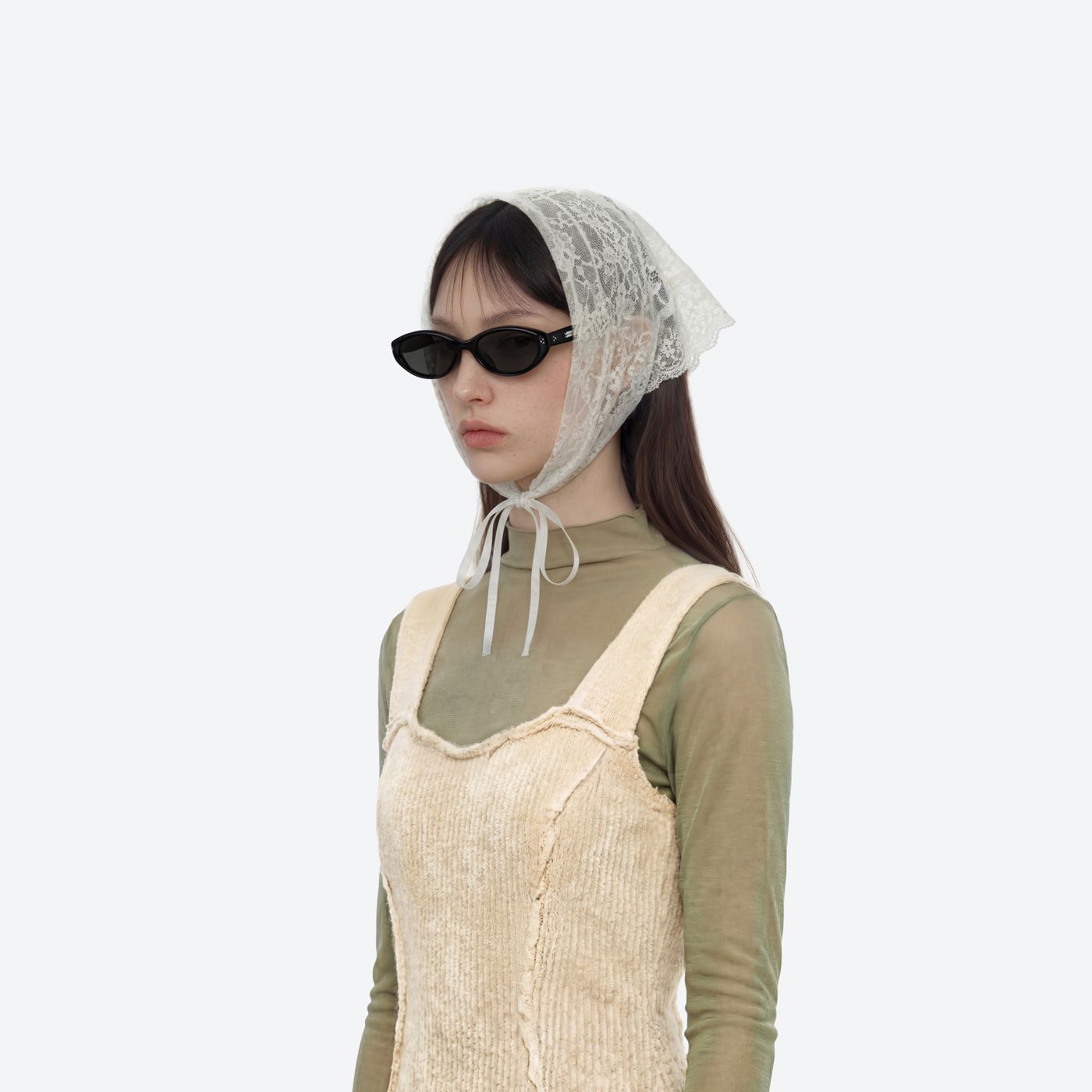 Model wearing the Cuscus 01 Black Acetate framed Oval sunglasses.