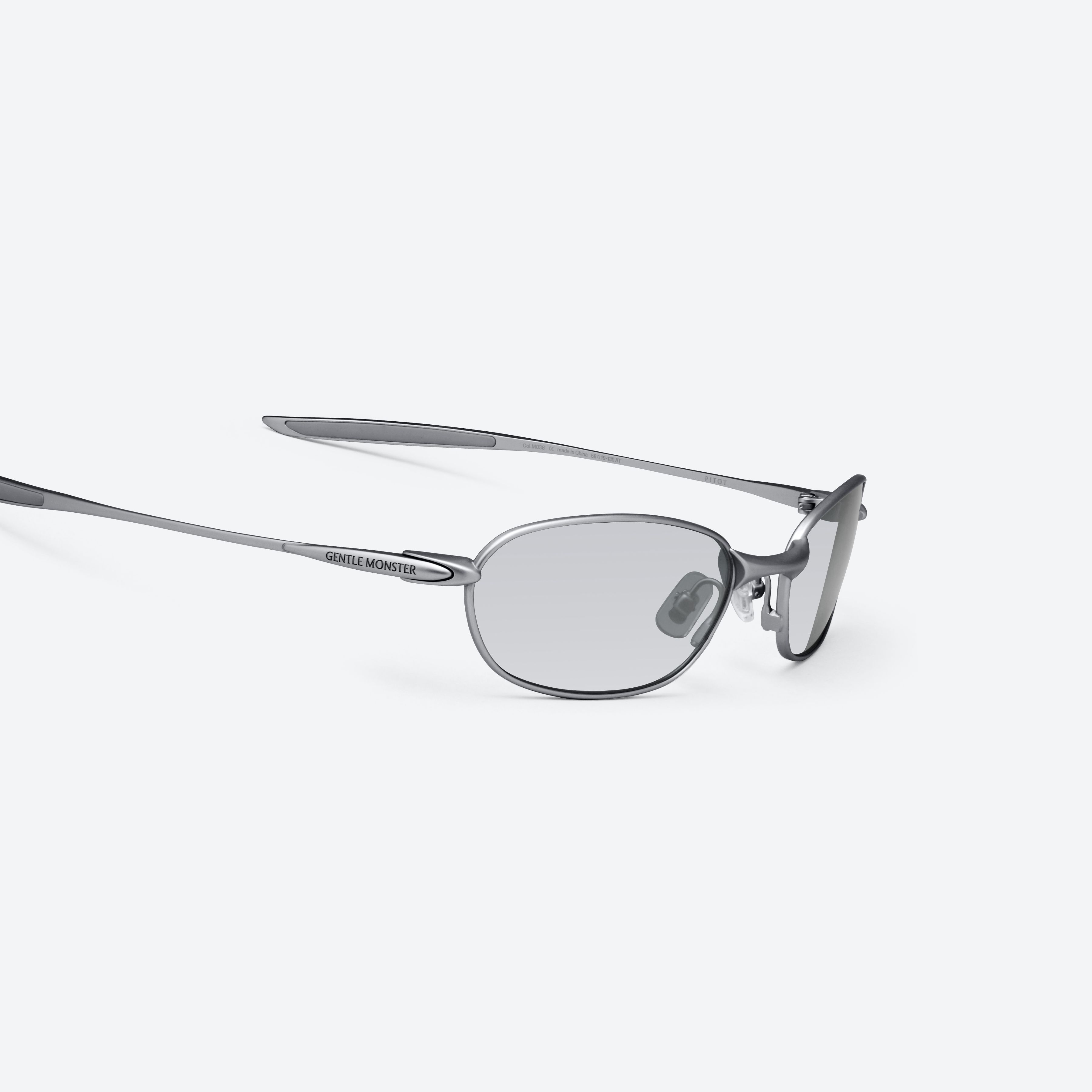 45-degree detailed view of Gentle Monster Pitot M021 Gray Metal framed Wraparound sunglasses.