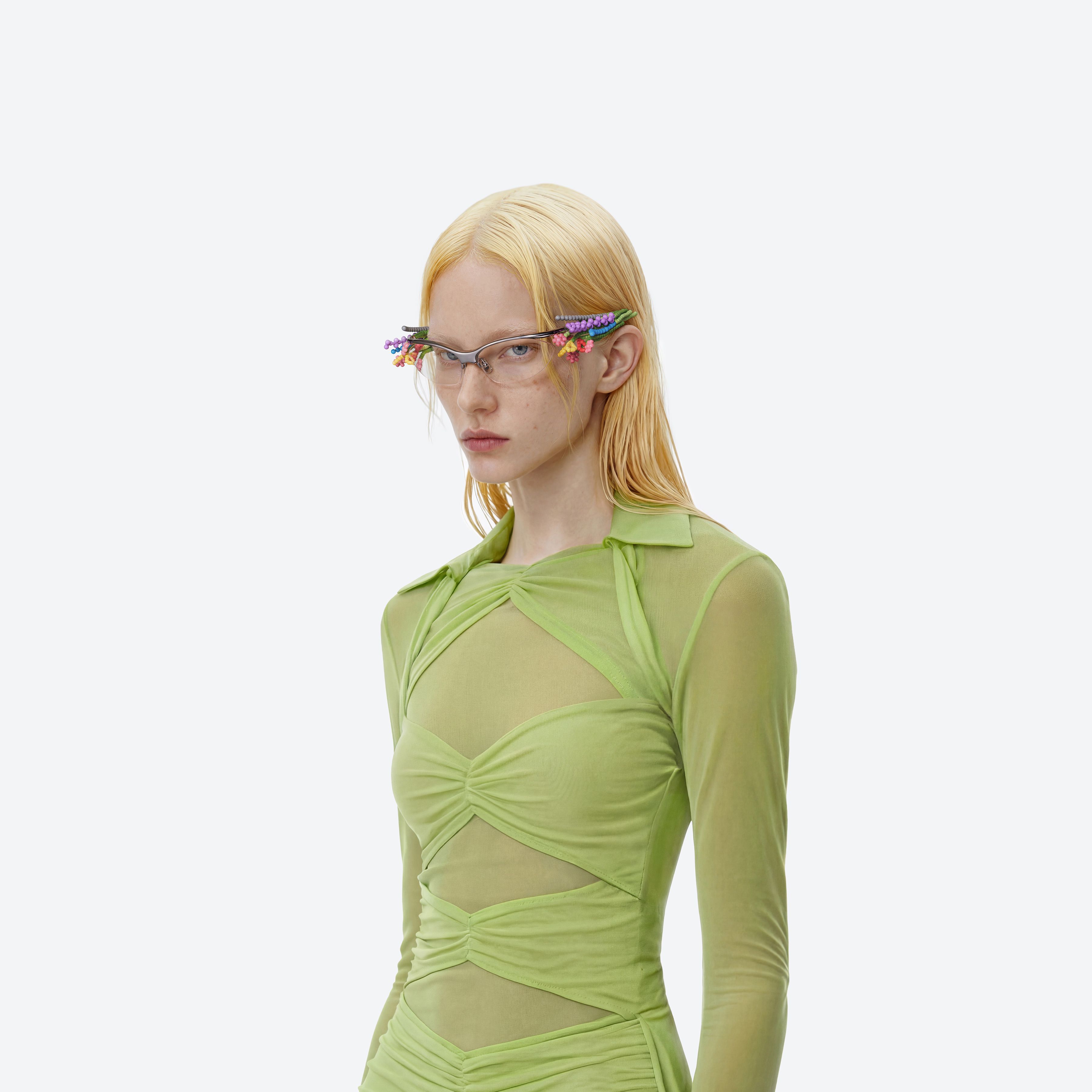 Model wearing the Bouquet 02 Silver Mixed framed Wraparound glasses.