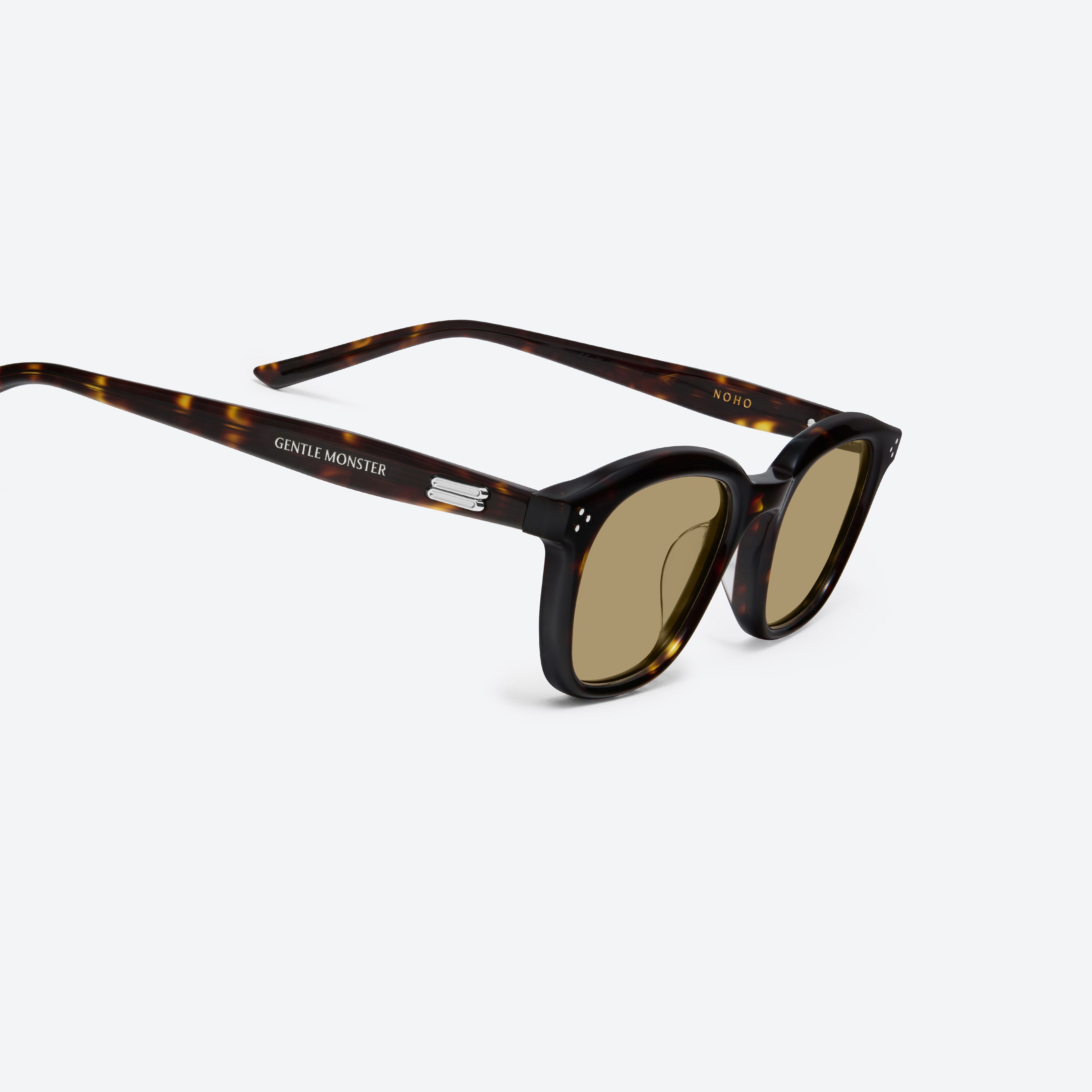 45-degree detailed view of Gentle Monster Noho T9 Tortoise Acetate framed Round sunglasses.