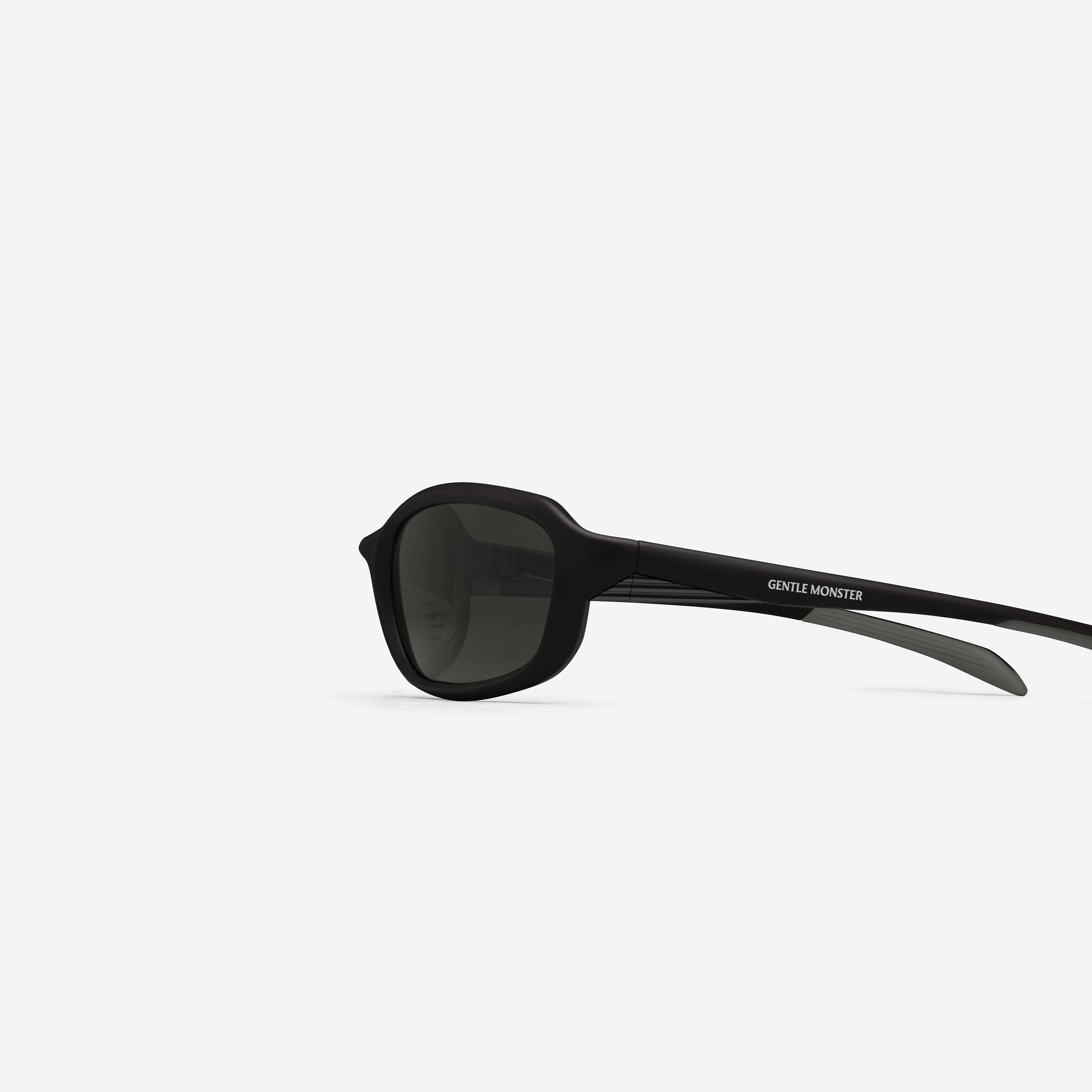 A detailed left view of Gentle Monster Volt M01 Black Nylon framed Wraparound sunglasses.
