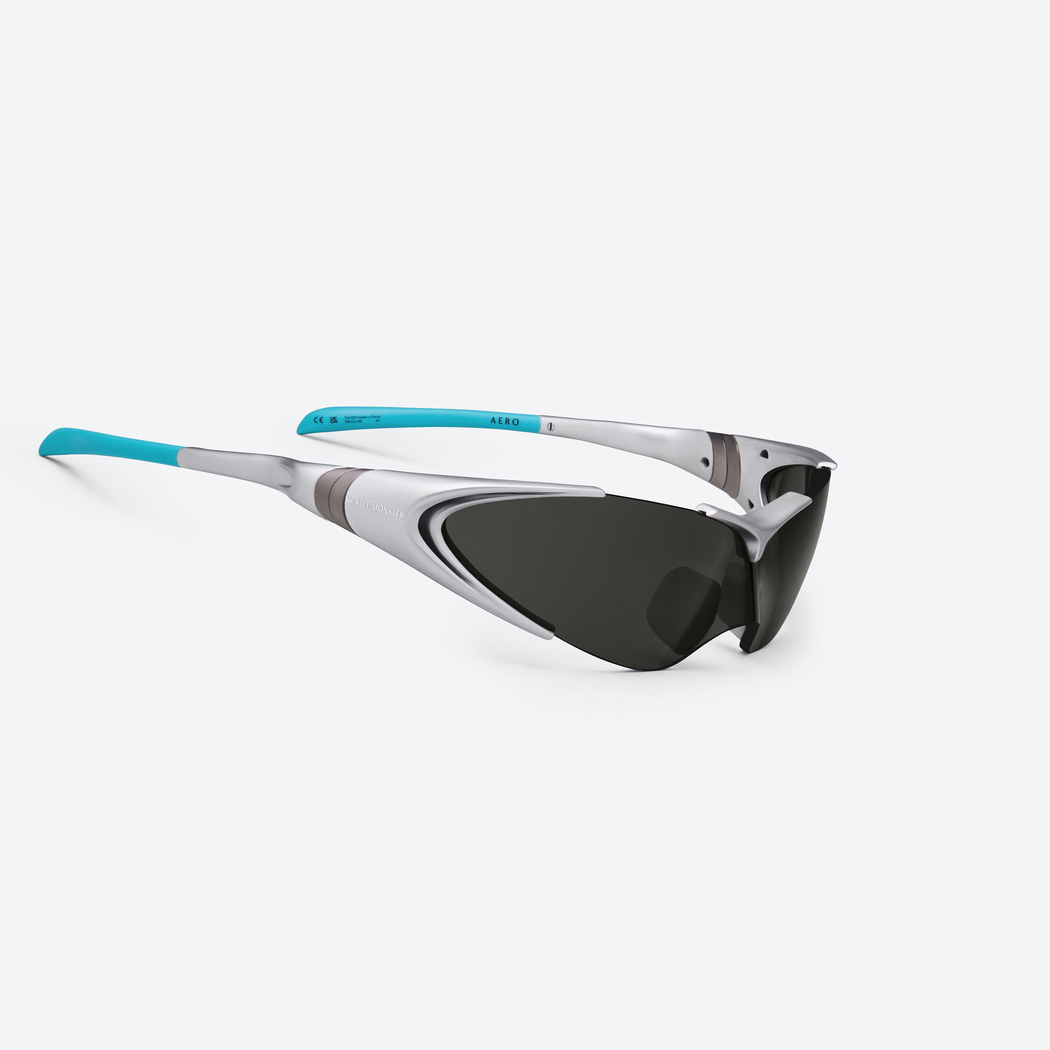 45-degree detailed view of Gentle Monster Disney F1 - Aero G21 Gray Nylon framed Wraparound sunglasses.