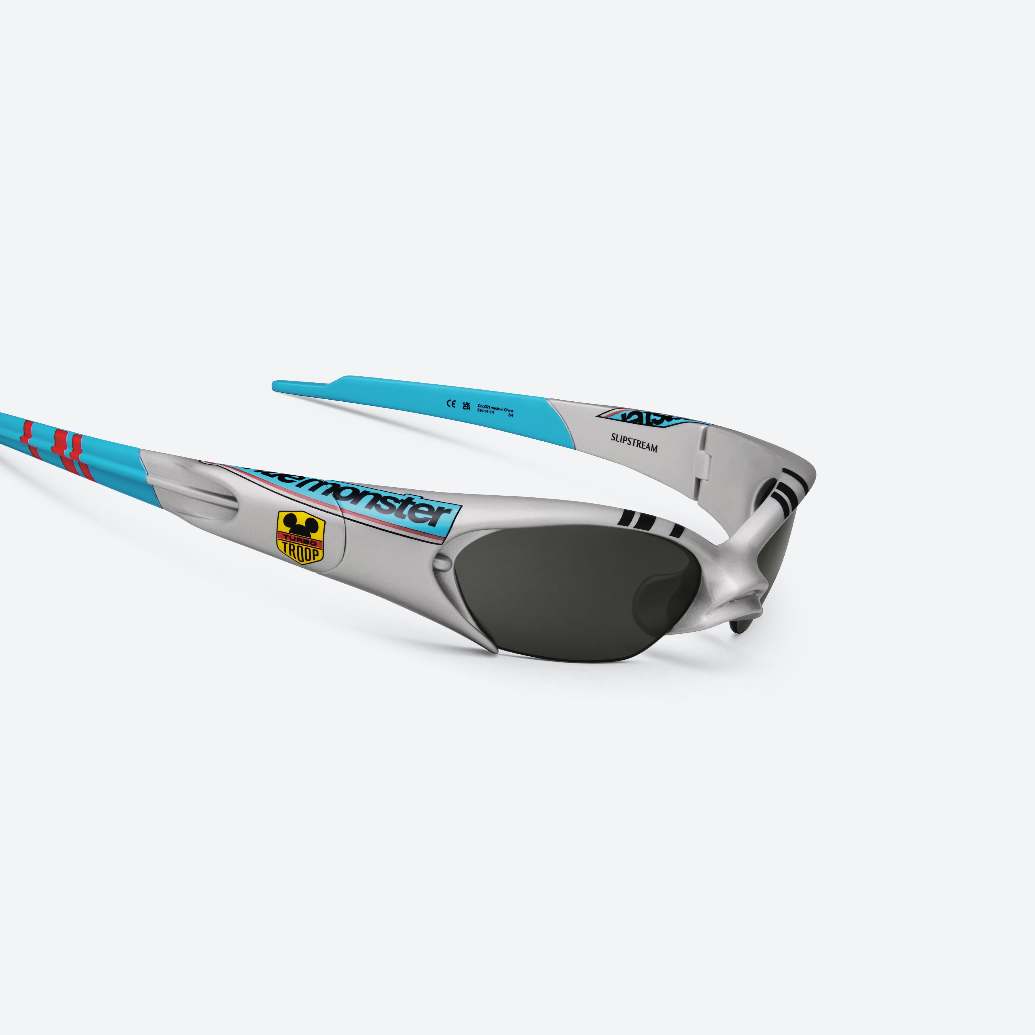 45-degree detailed view of Gentle Monster Disney F1 - Slipstream G21 Gray Nylon framed Wraparound sunglasses.