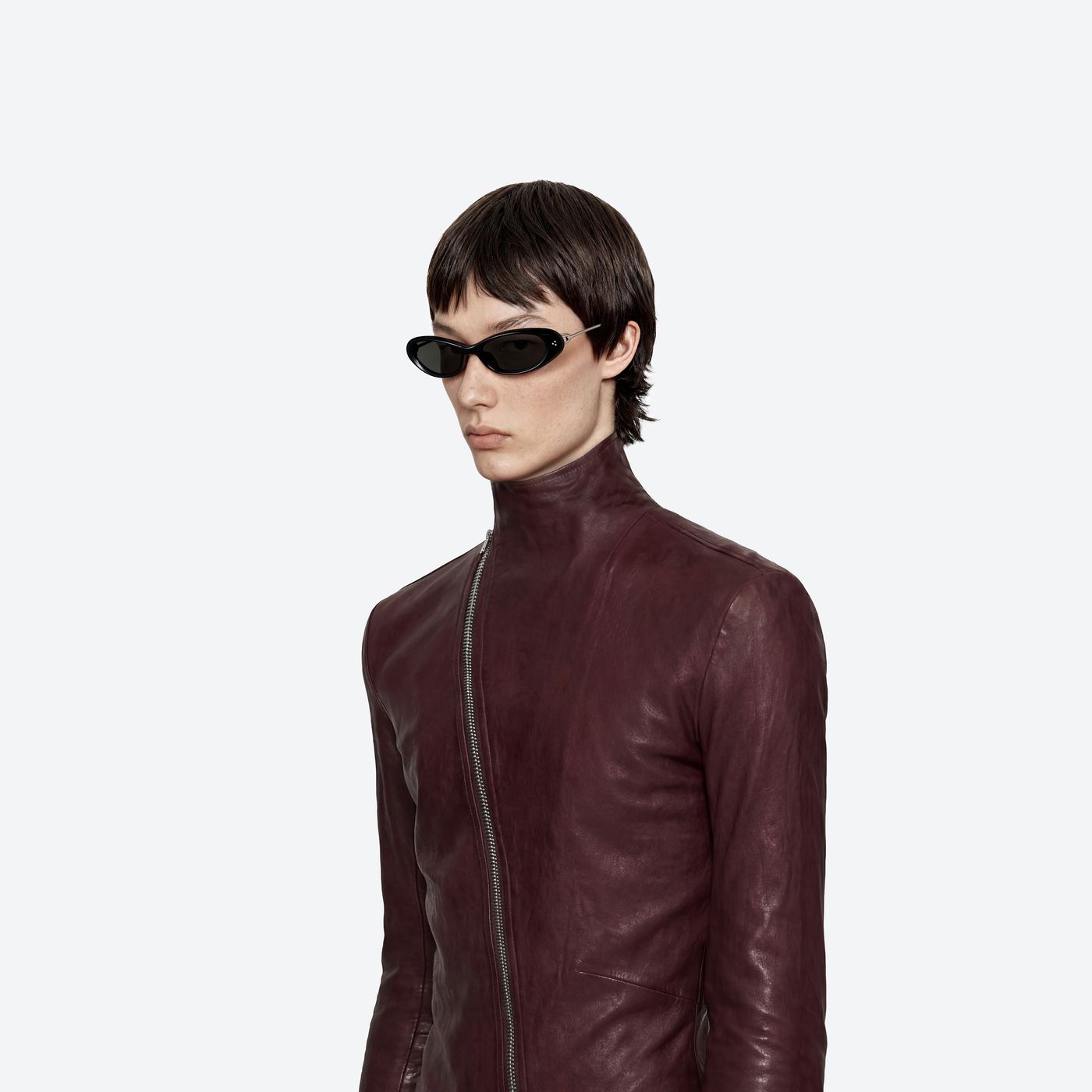 Model wearing the Ora 01 Black Mixed framed Oval sunglasses.