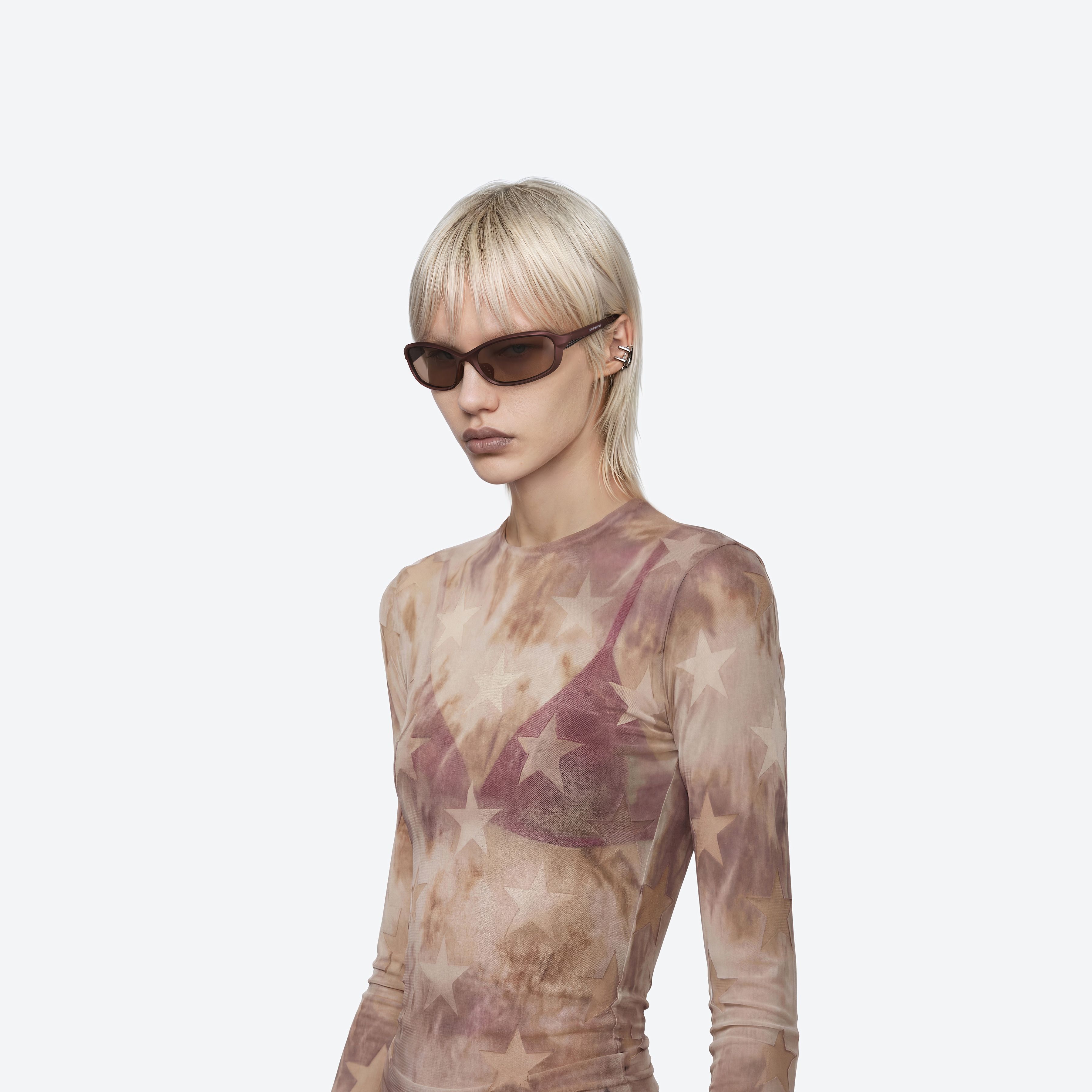 Model wearing the Volt MBR5 Brown Nylon framed Wraparound sunglasses.