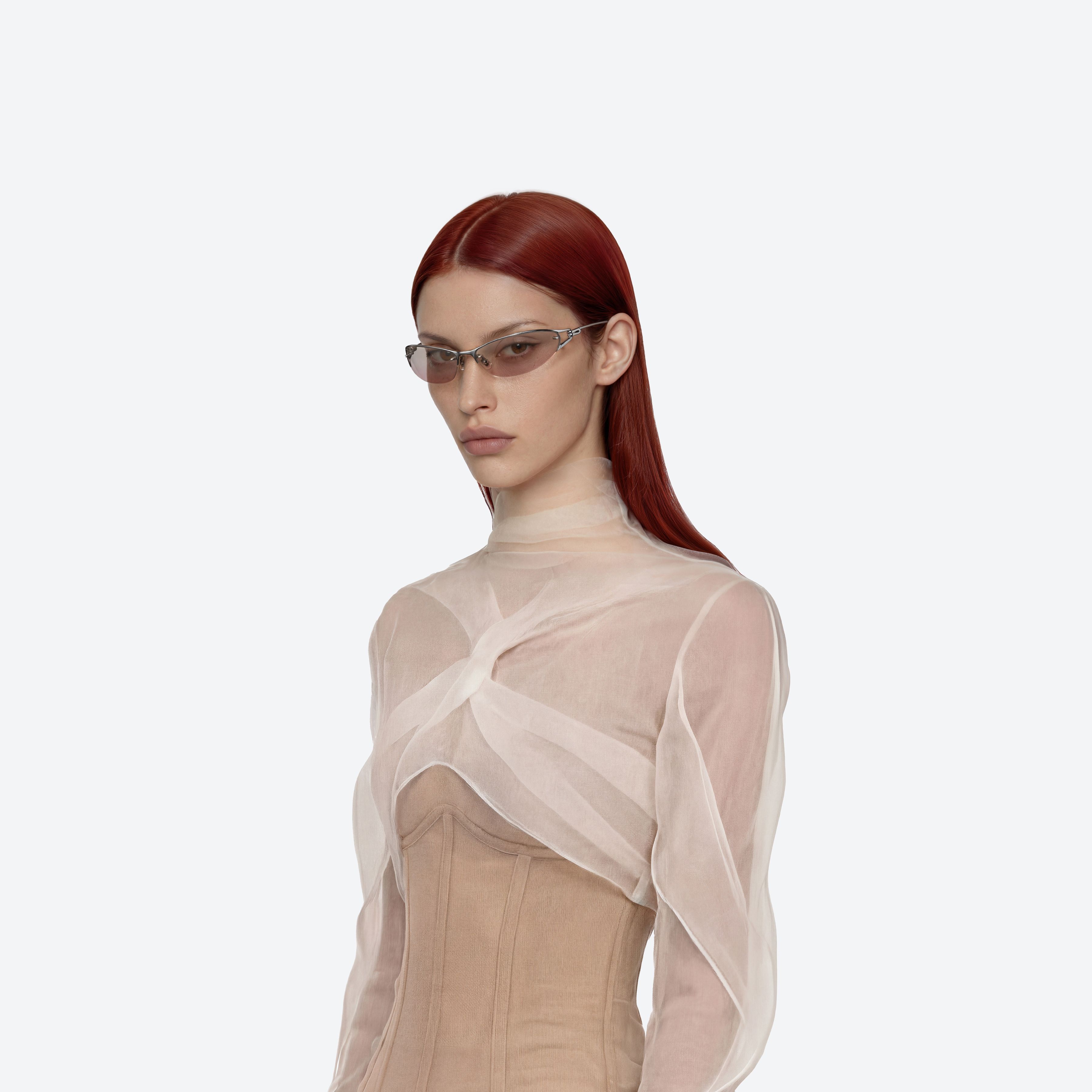 Model wearing the Futura 02(BRG) Silver Metal framed Wraparound sunglasses.