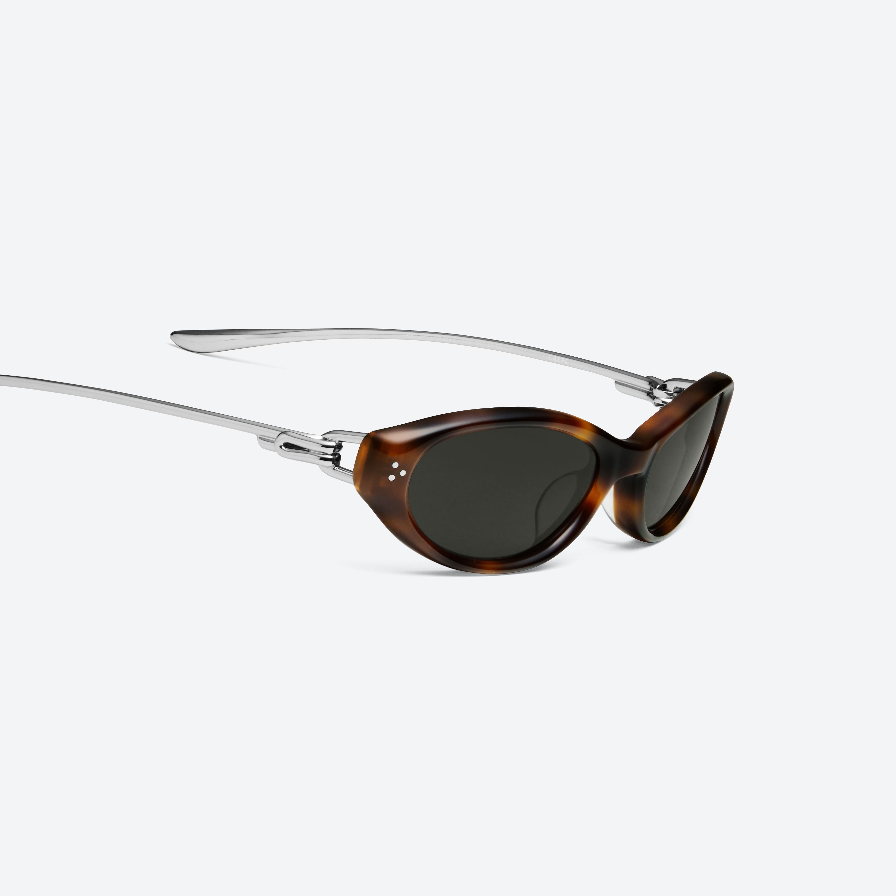 45-degree detailed view of Gentle Monster Crepe L2 Tortoise Mixed framed Cat-eye sunglasses.