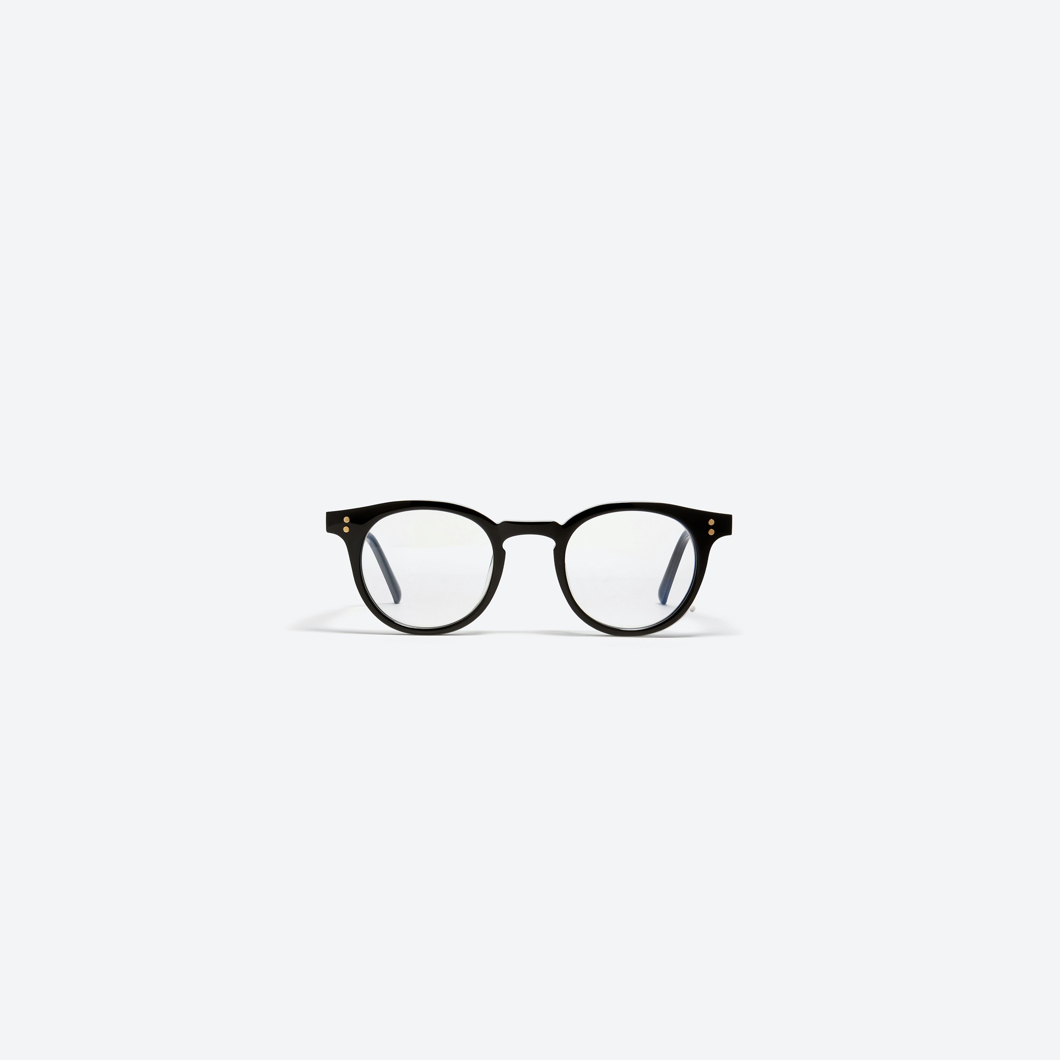 A front view of Gentle Monster Milan 01 Black Acetate framed Round glasses.
